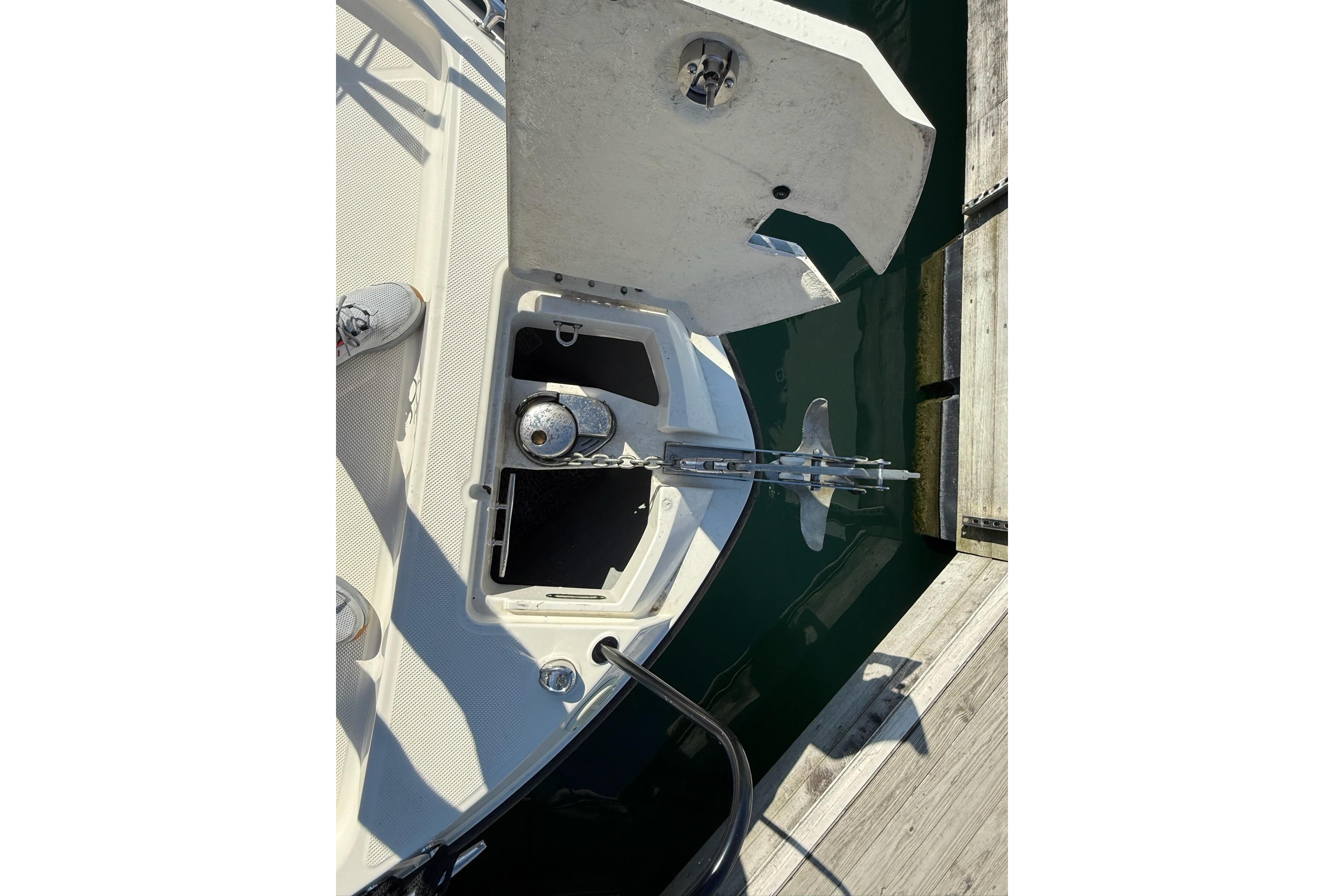 2024 Bayliner Trophy T25 Pilothouse anchor compartment and deck detail at dock.