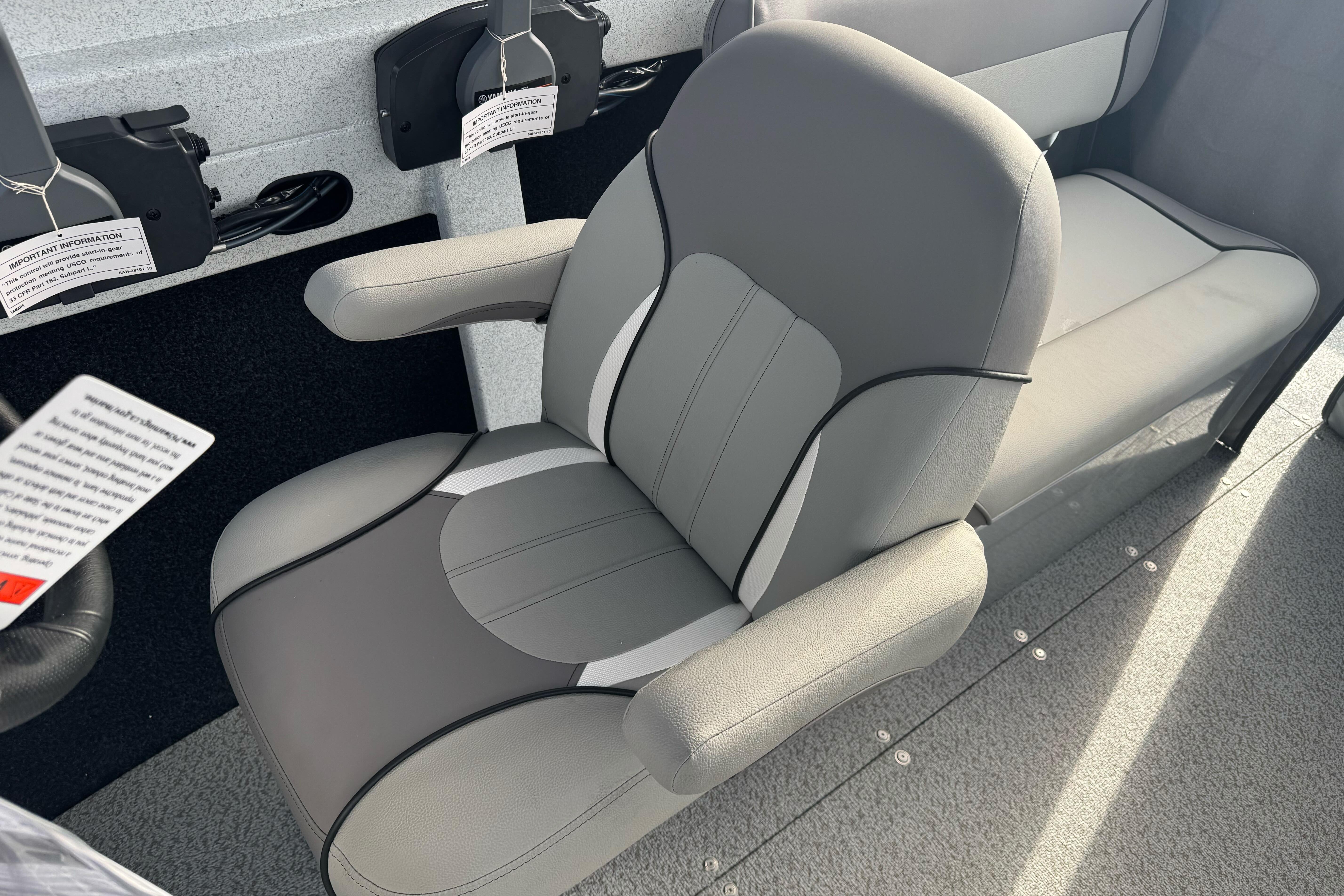 Gray seating in 2026 KingFisher 2025 Escape boat, featuring modern design and comfort.