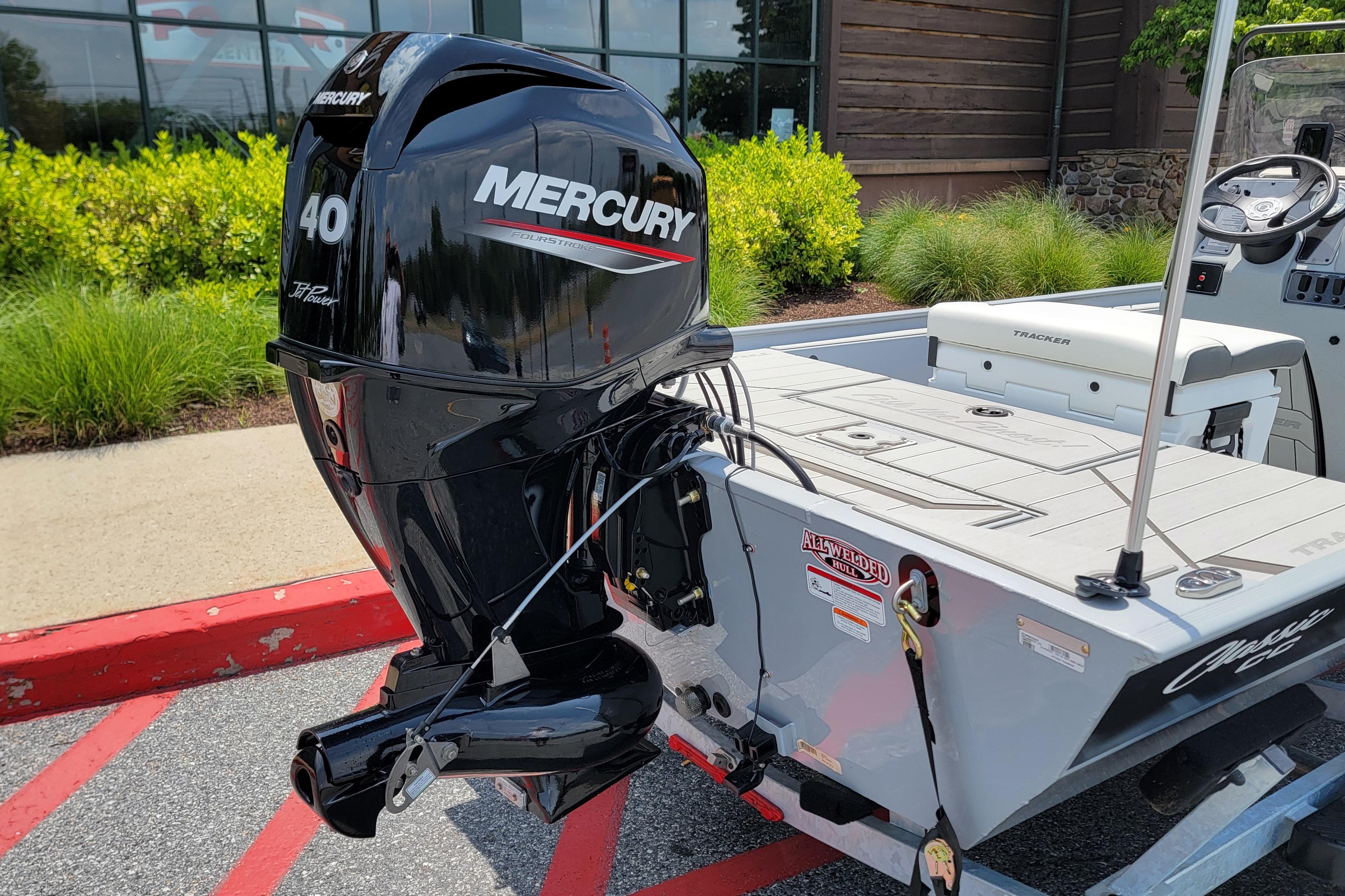 2026 Tracker Bass Tracker Classic CC with Mercury 40 HP outboard motor, parked outdoors.
