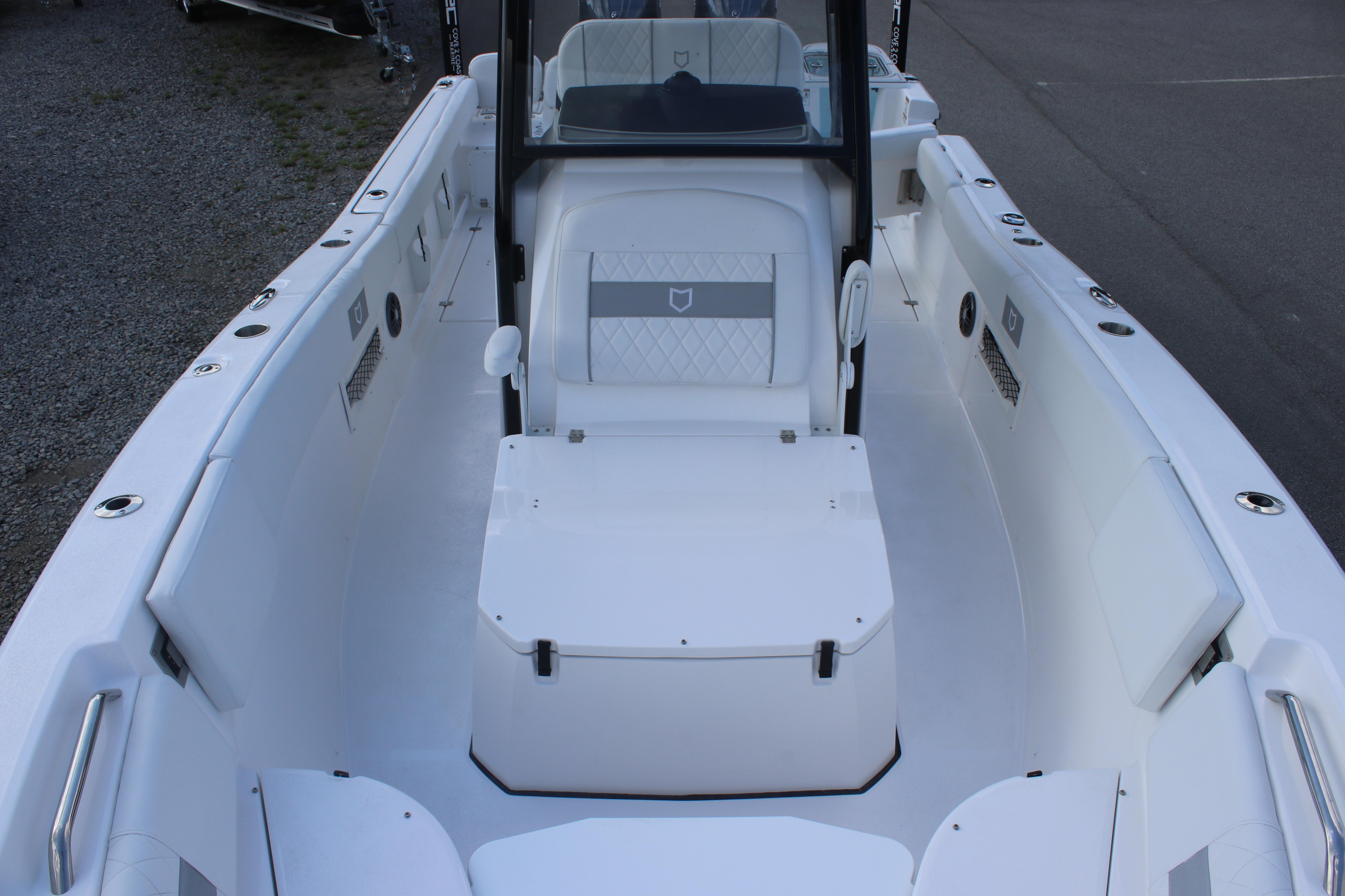 2026 Sea Fox 268 Commander boat interior with seating and storage.