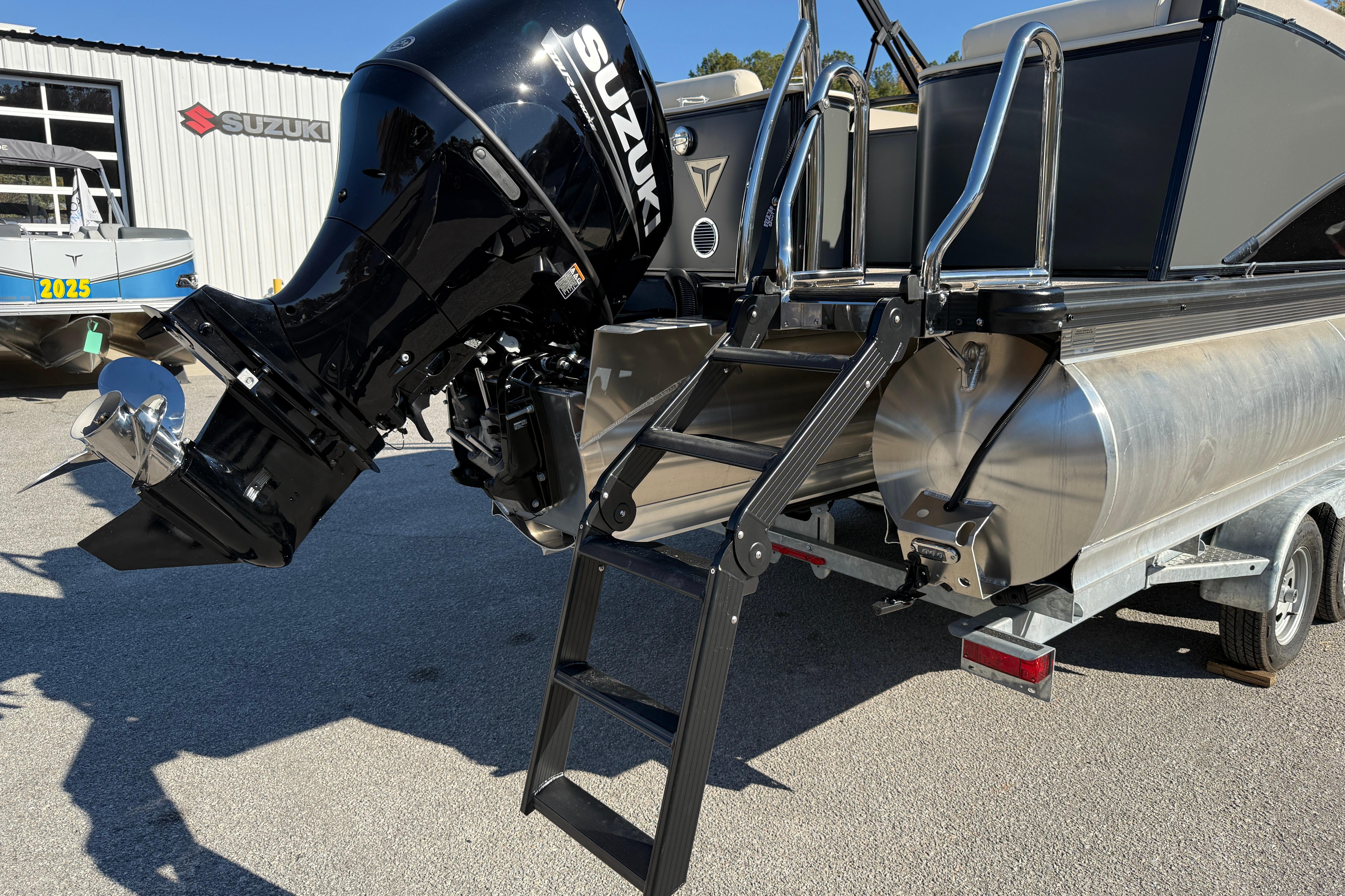 2026 Tahoe Pontoon Cascade Quad Lounger Windshield with Suzuki outboard motor and ladder.