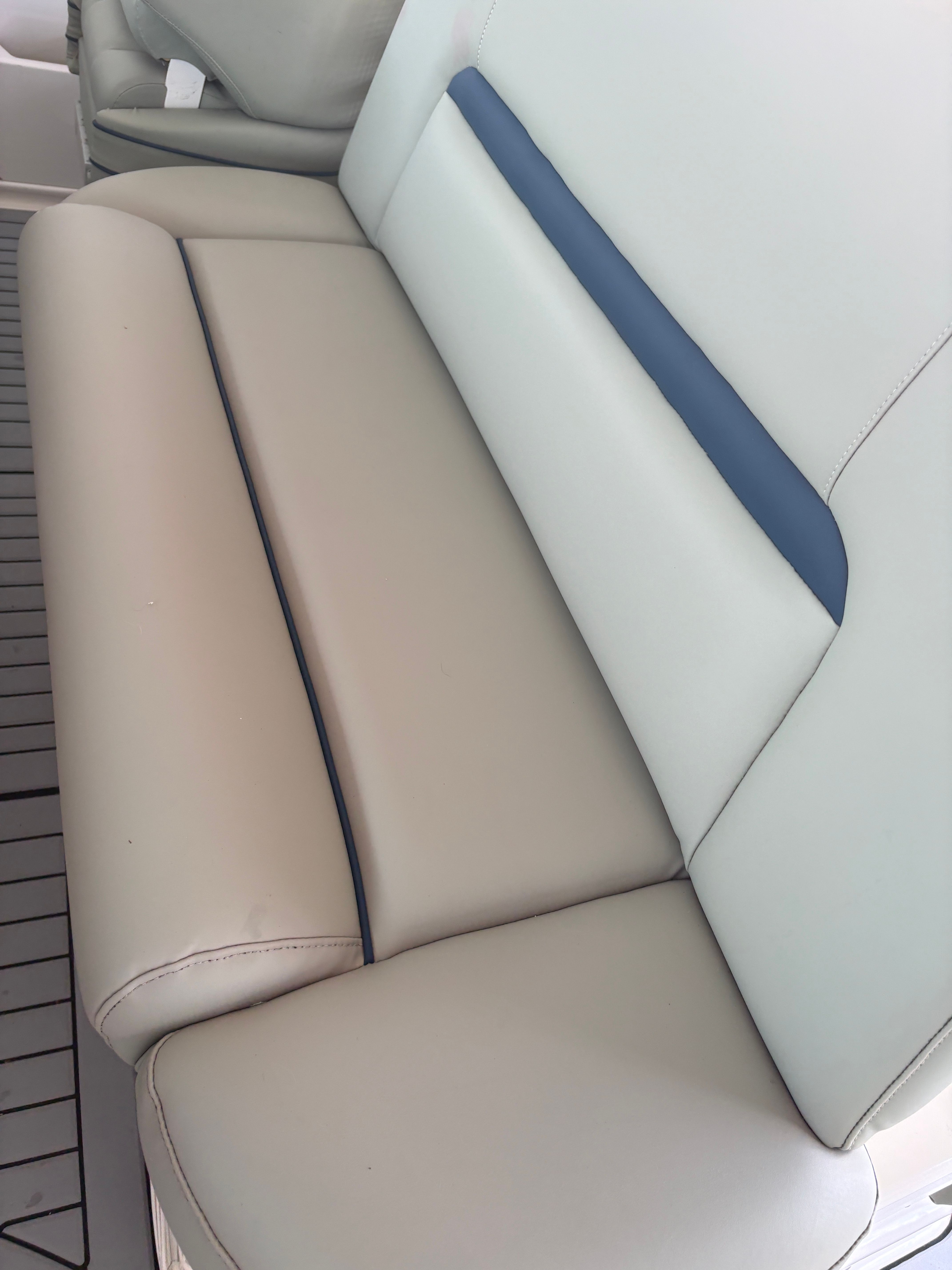 2005 Sea Ray 420 Sundancer upholstery, cream with blue accents.