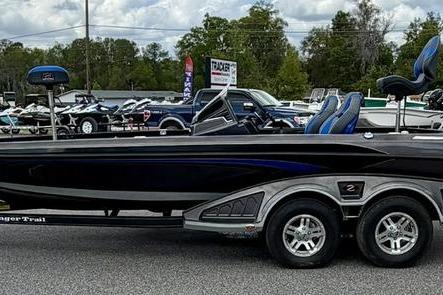 2023 Ranger Z520R boat on trailer, parked outdoors with other boats in background.