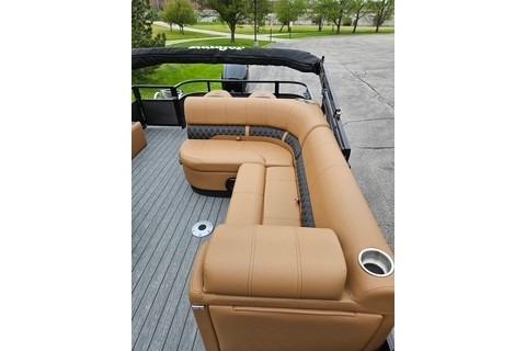 2026 Ranger 220FC boat interior with tan seating and cup holders.