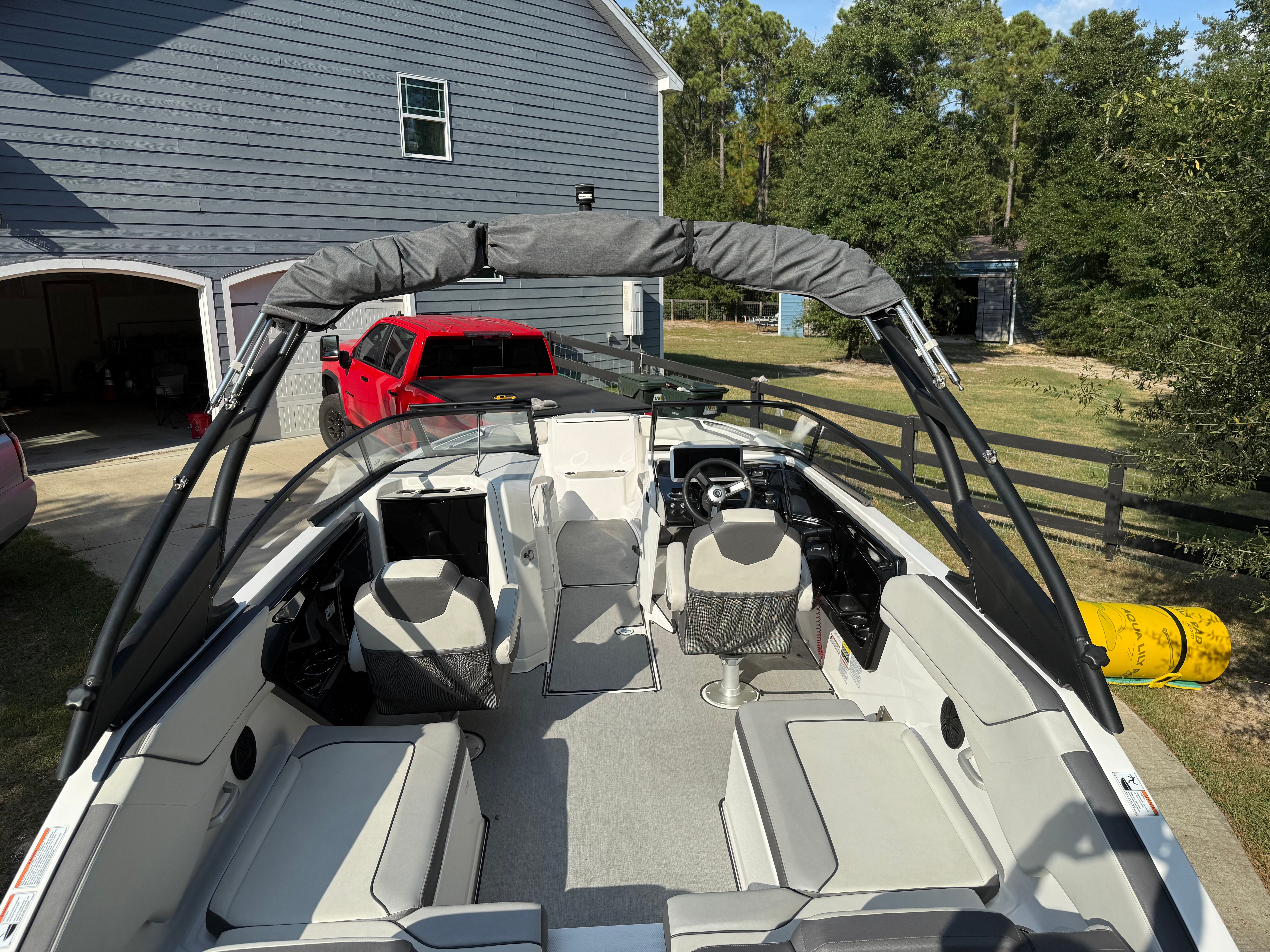 2021 Yamaha AR250 boat parked outdoors, interior view.