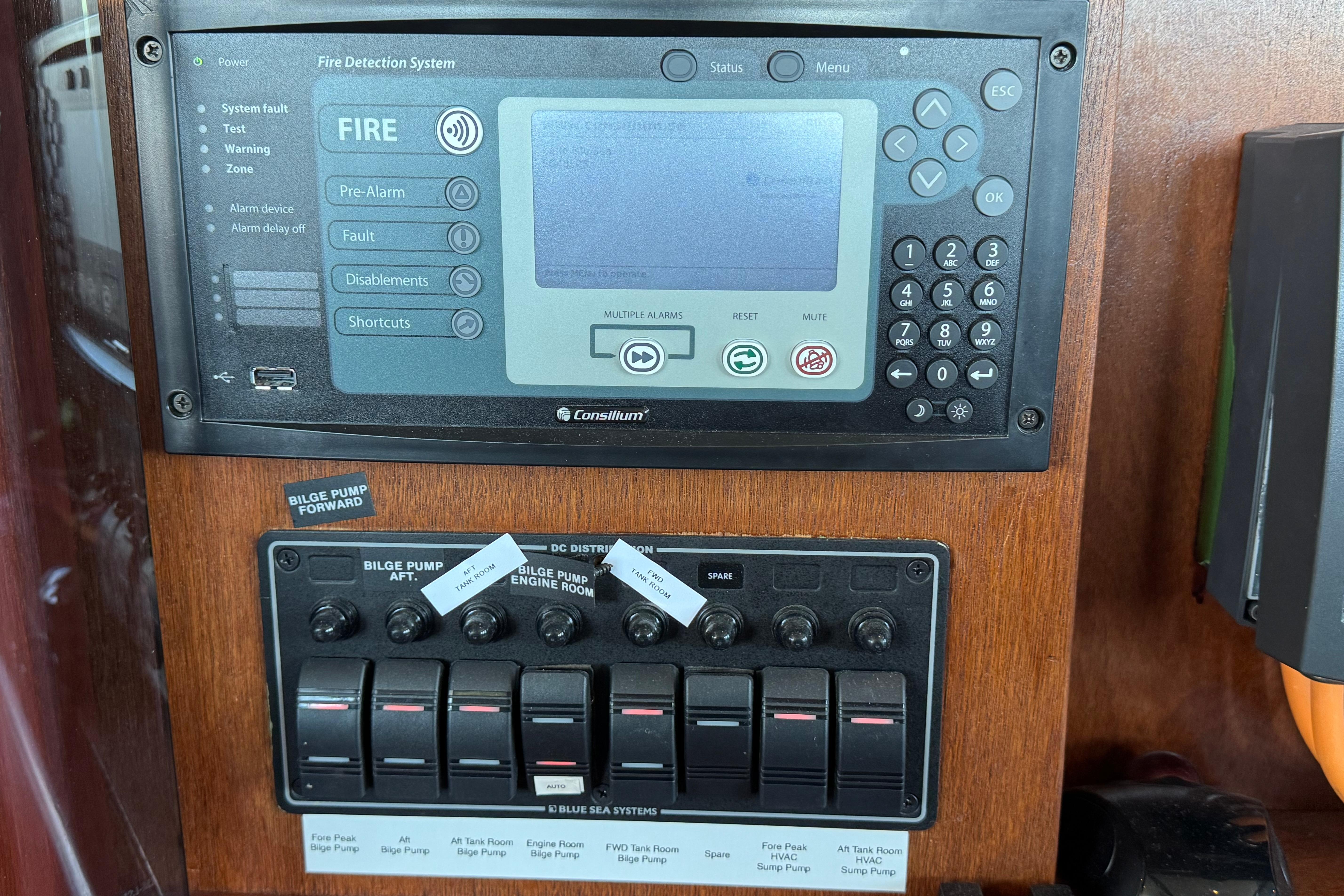 Control panel with fire detection system and bilge pump switches on a Doogersbank Vipack, 2001 model.