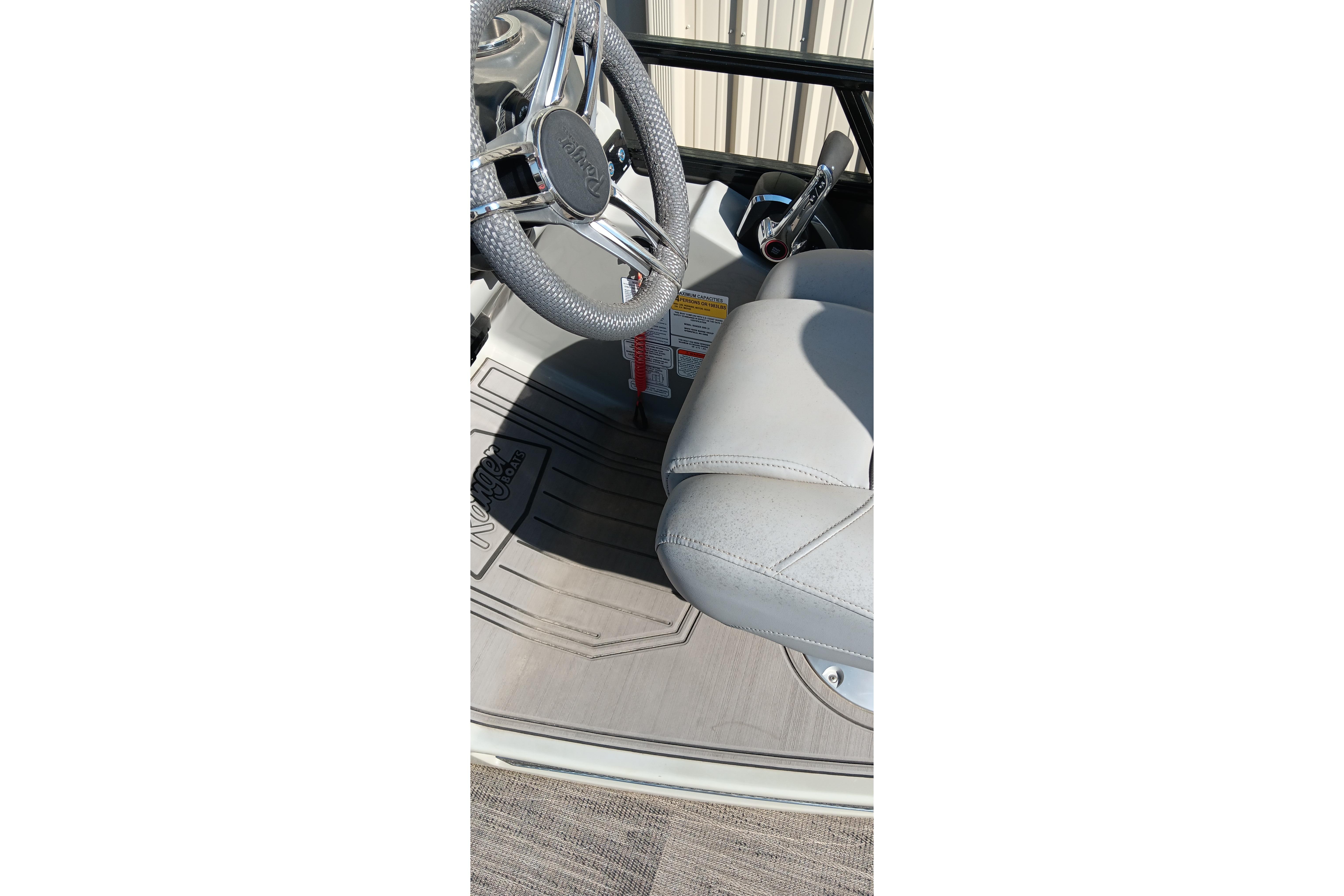 2023 Ranger 2500LS boat interior with steering wheel and seat detail.