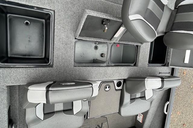 Interior view of 2025 Ranger ALPHA 208 boat with seating and storage compartments.
