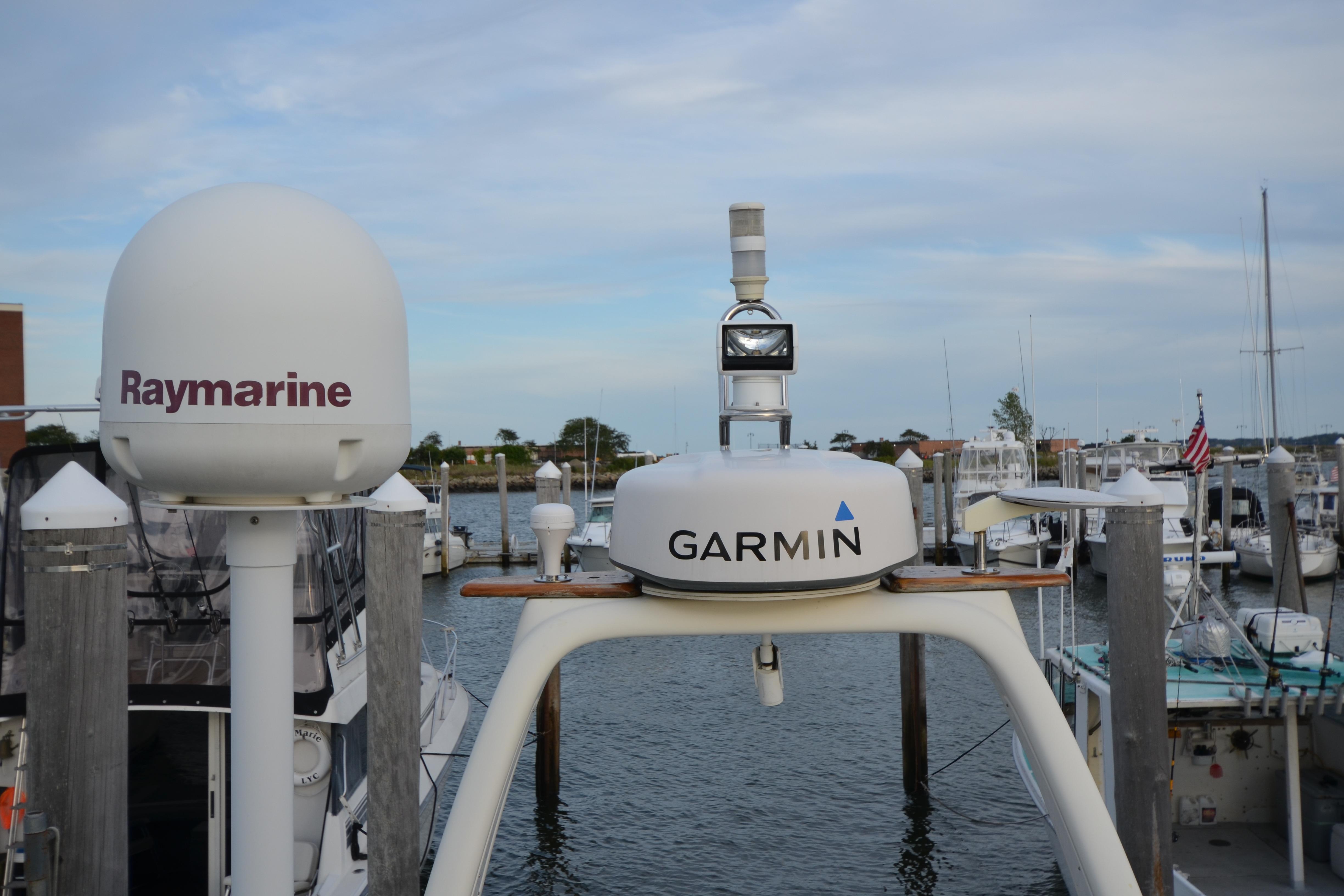 Radar equipment on a 2007 Jeanneau Prestige 46 yacht at a marina.