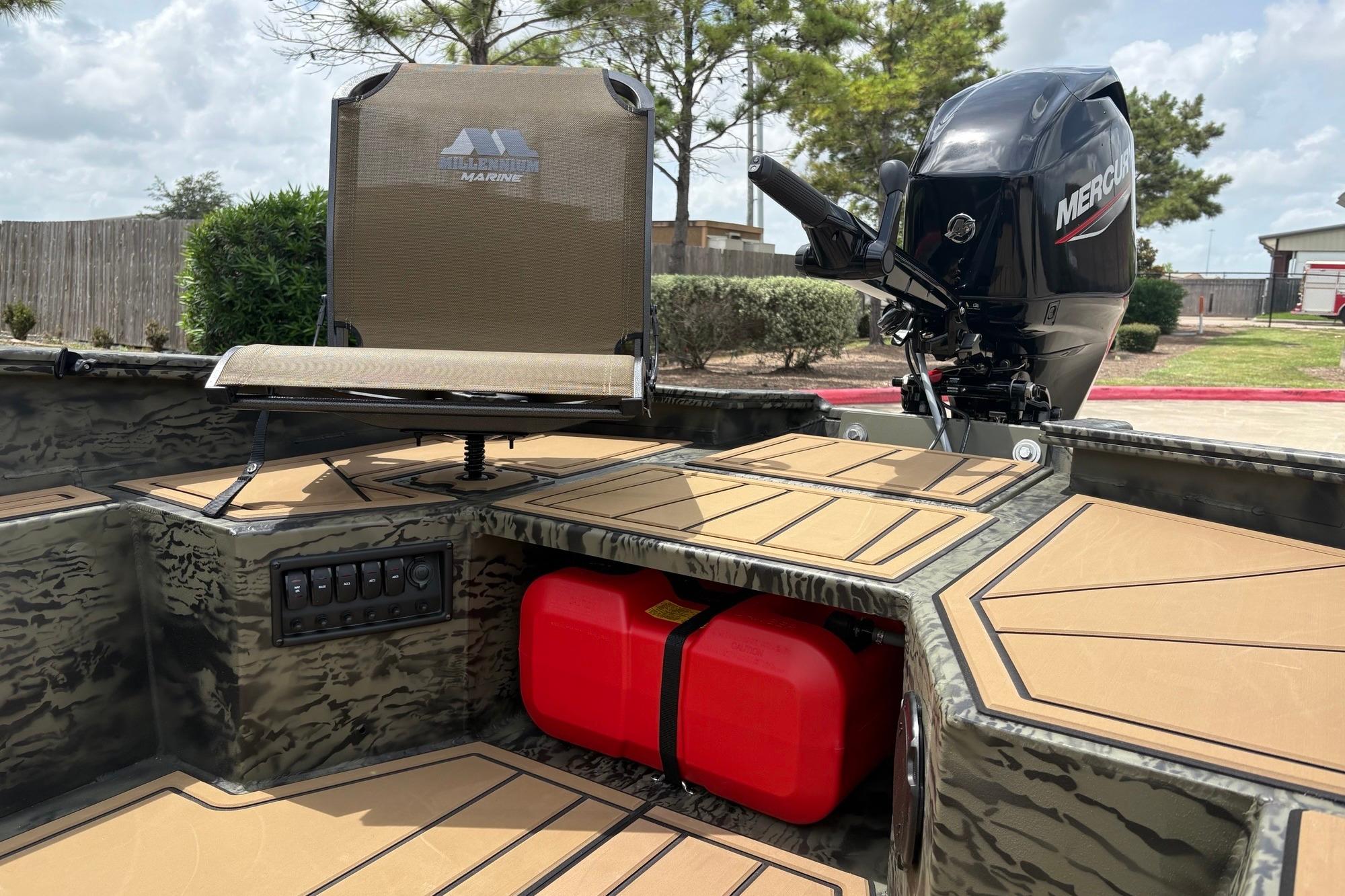 2026 Tracker Grizzly 1650 T Prairie Wings Edition boat interior with Mercury motor.