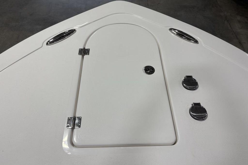 Bow deck of 2026 Tidewater 232 CC Adventure boat with hatch and fittings.