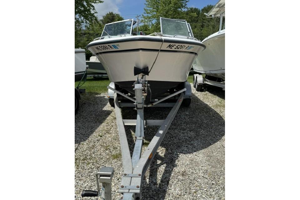 1997 Grady-White Tournament 192 boat on trailer, parked outdoors.