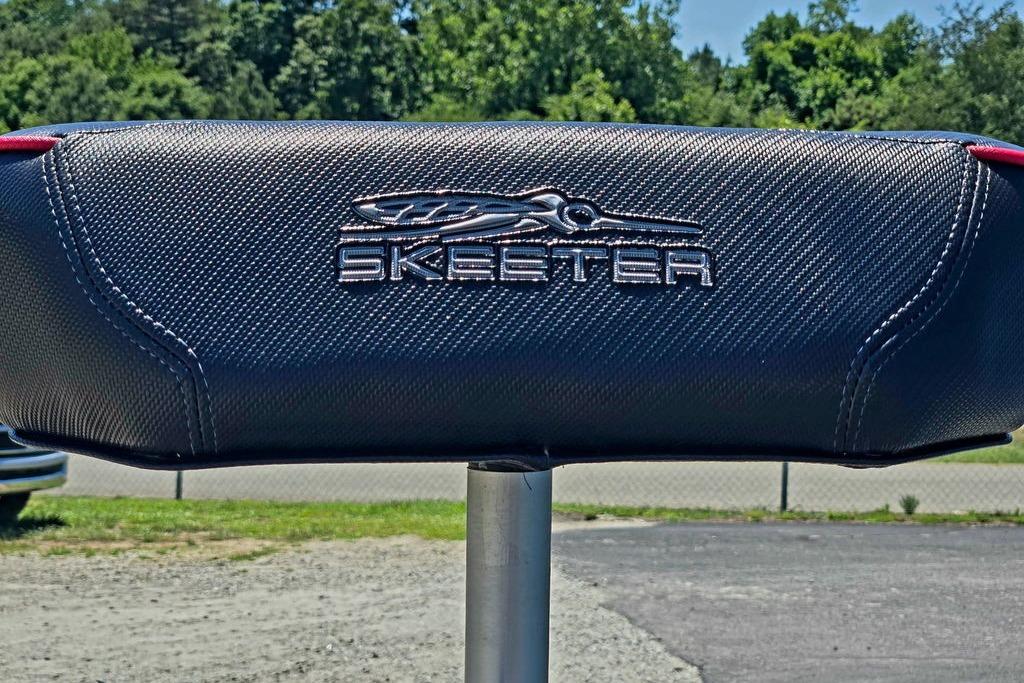 Skeeter ZXE20 2026 boat seat with logo, outdoors on a sunny day.