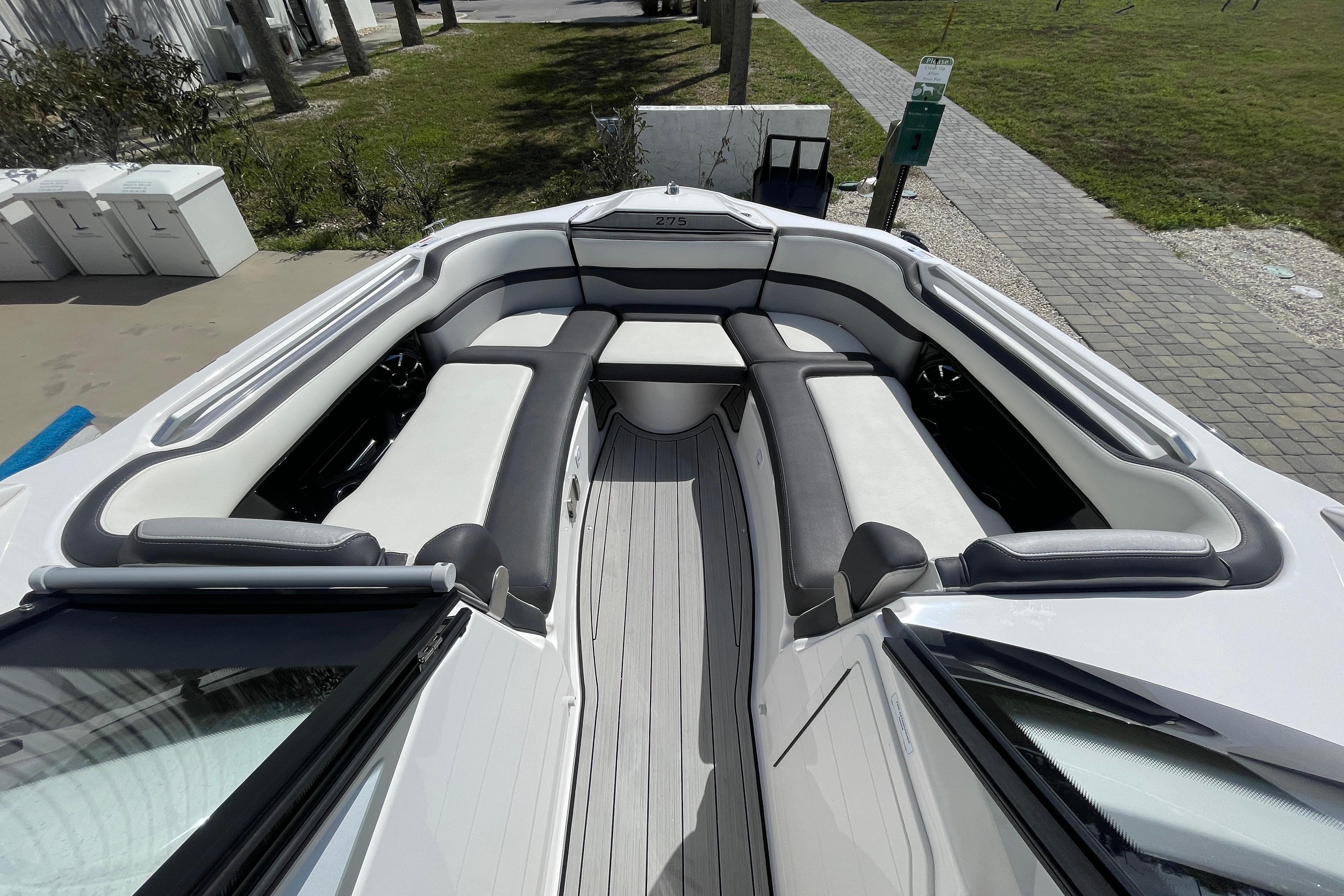2021 Yamaha Boats 275SE interior with spacious seating and sleek design.