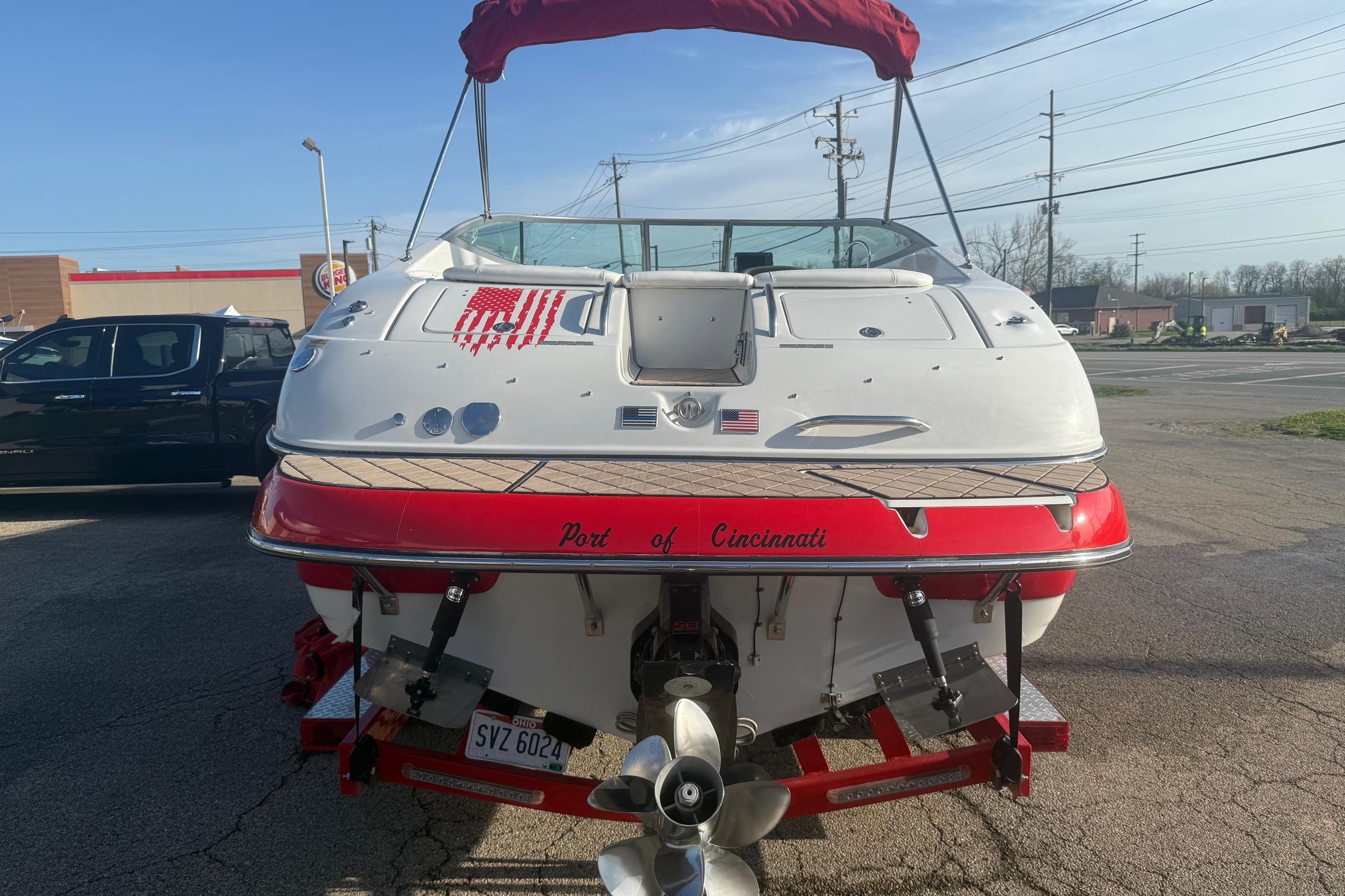 2005 Crownline 270 BR boat with red accents, parked in Cincinnati.
