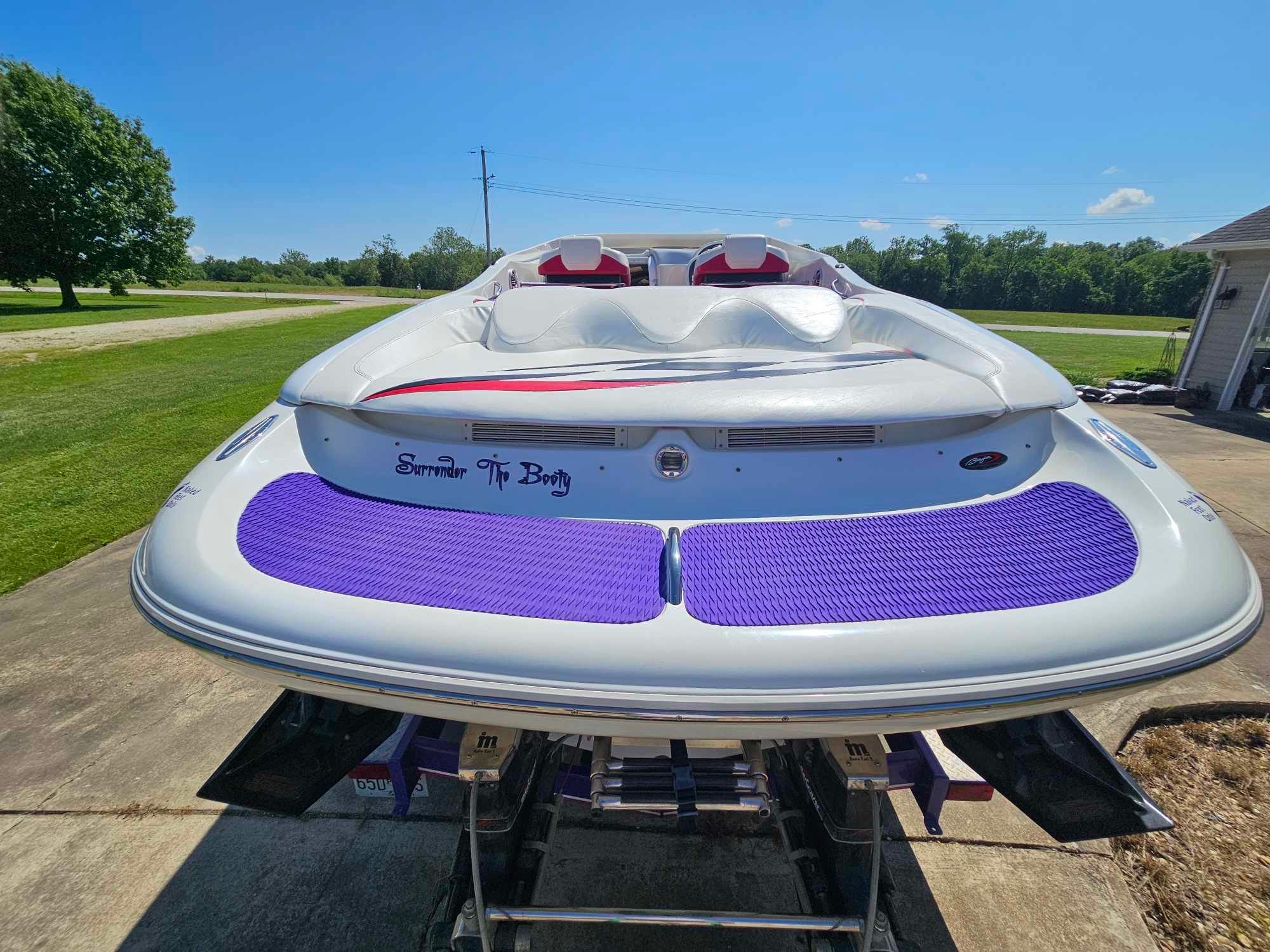 1997 Baja 38 Special Boss boat with purple padding.