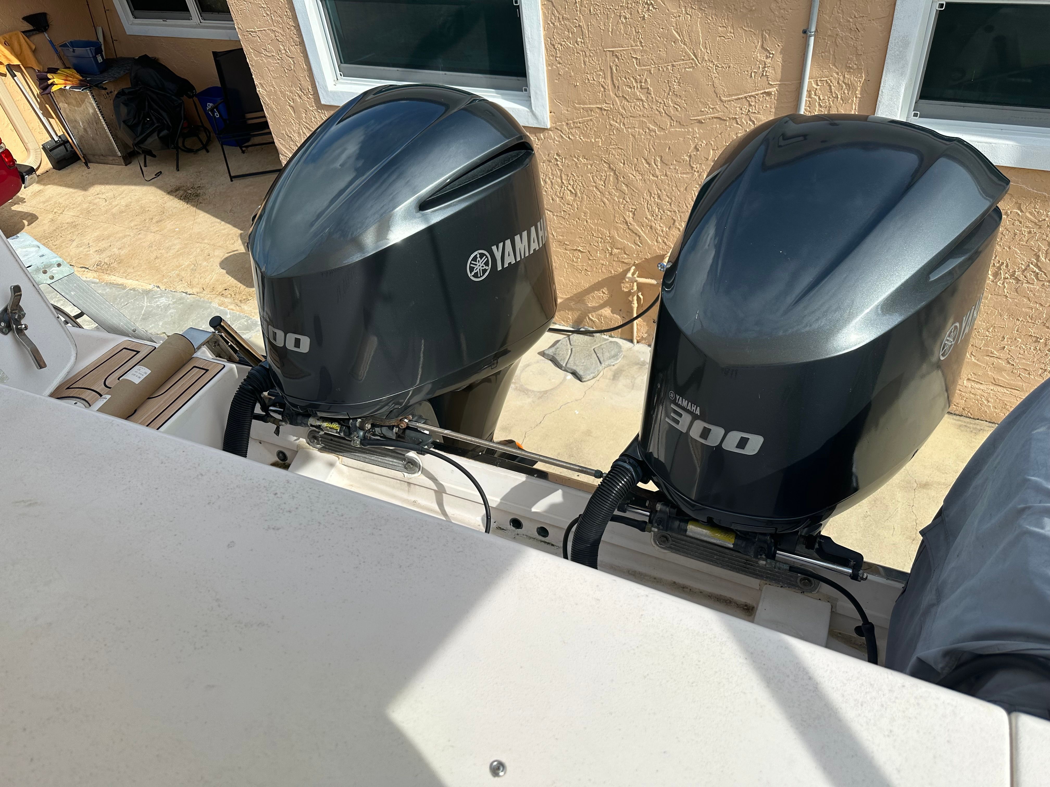 Two Yamaha outboard engines are mounted on the stern of a boat.