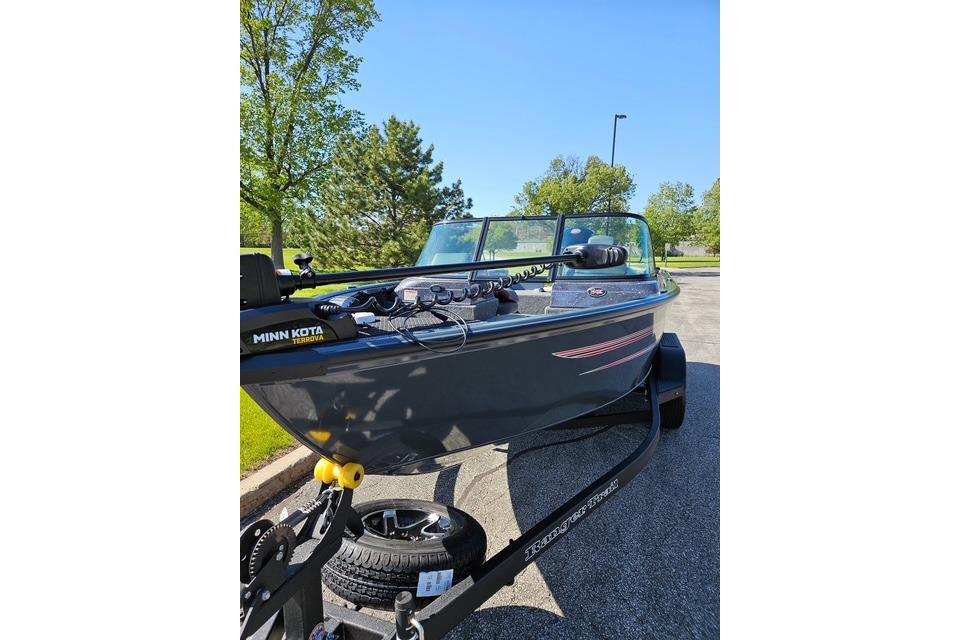 2026 Ranger VS1882SC Angler boat on trailer, parked outdoors.
