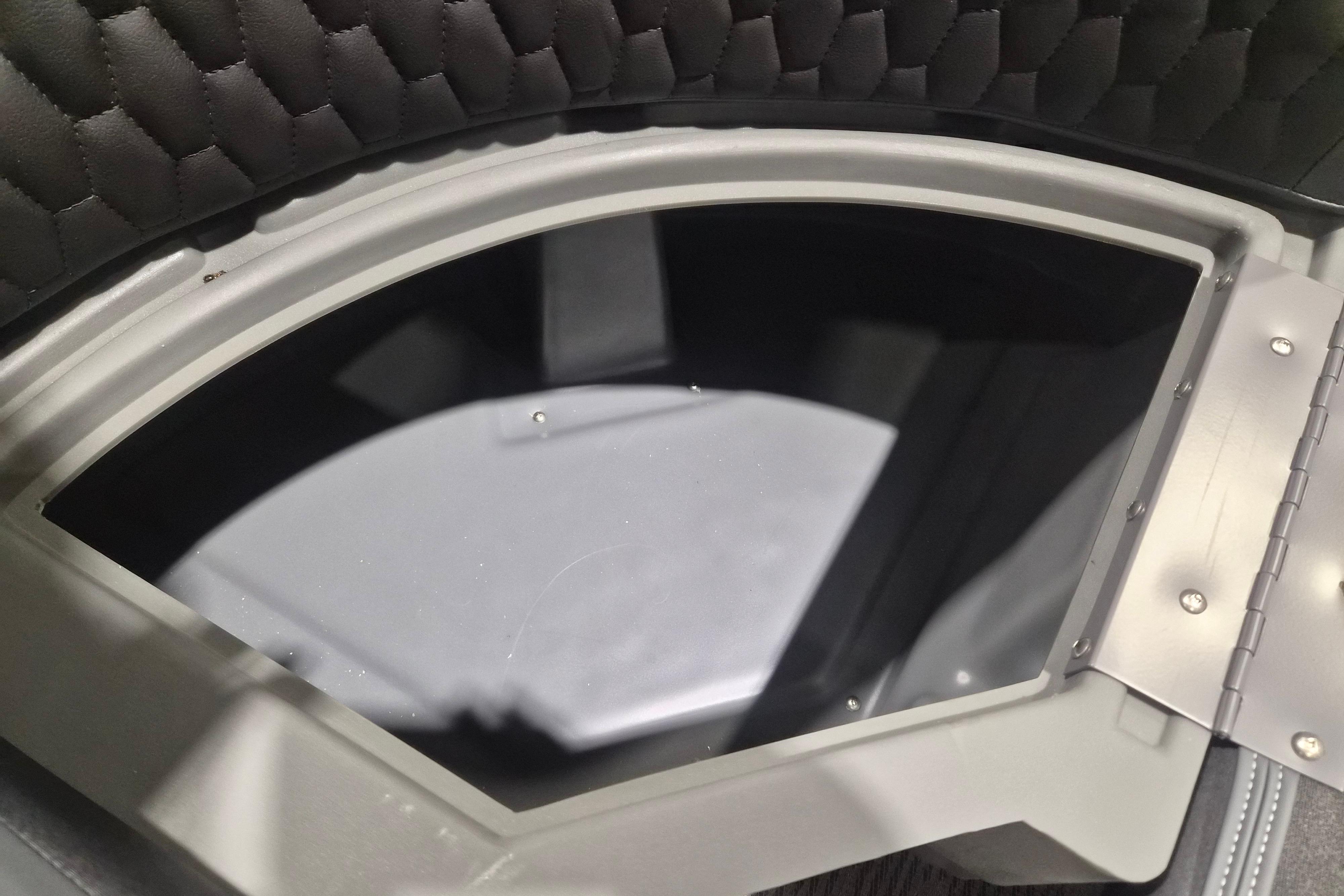 Interior view of a 2026 Sylvan L3 ULZ boat storage compartment with quilted lining.