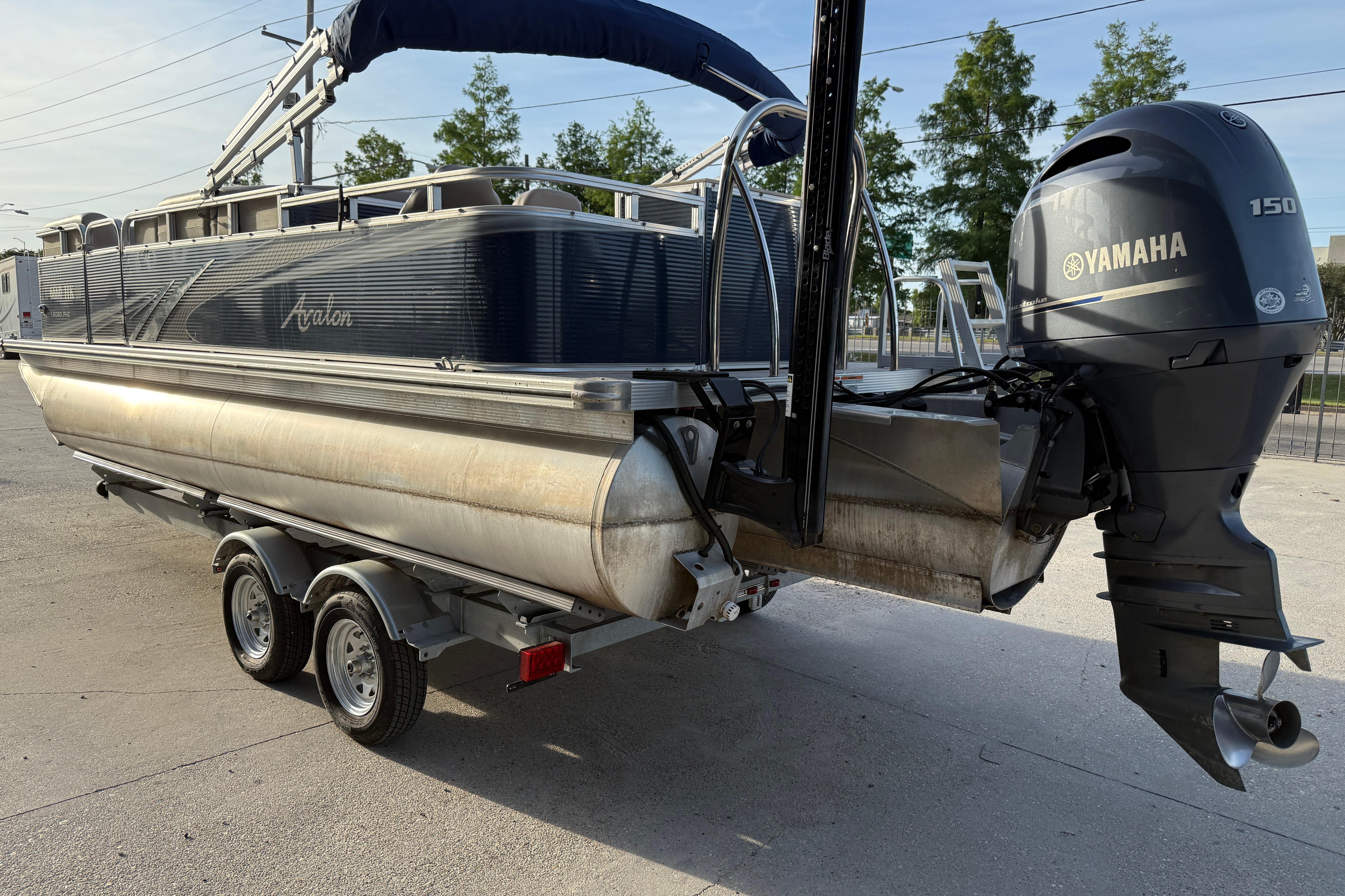 2019 Avalon Venture Fish N Cruise 20' pontoon boat with Yamaha 150 engine on trailer.