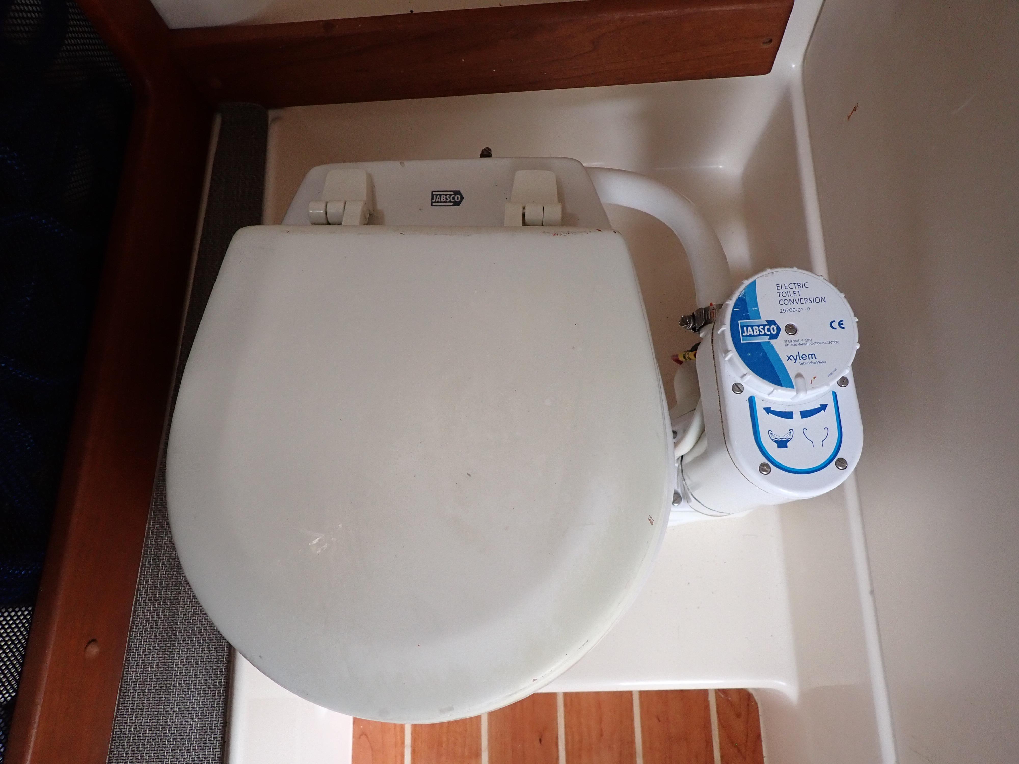 2019 Grady-White Freedom 275 boat toilet with manual flush system.