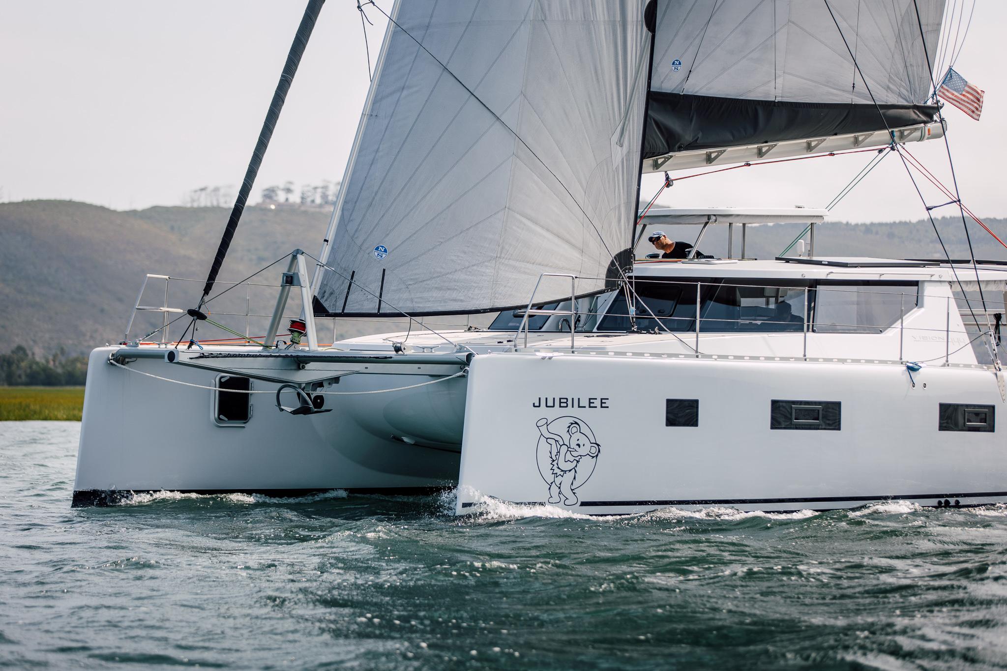 Modern Vision 444 catamaran Jubilee sailing on open water, 2025 model.