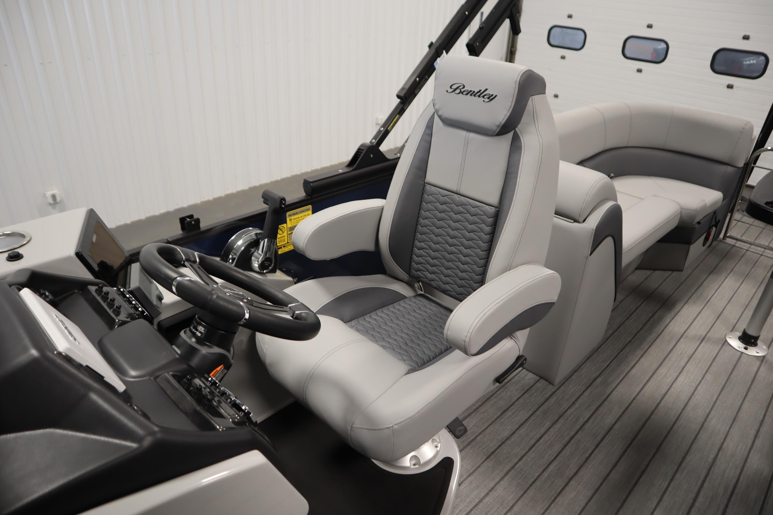 2025 Bentley Pontoons Elite 253 Admiral Tri-toon interior with luxurious seating and modern helm.
