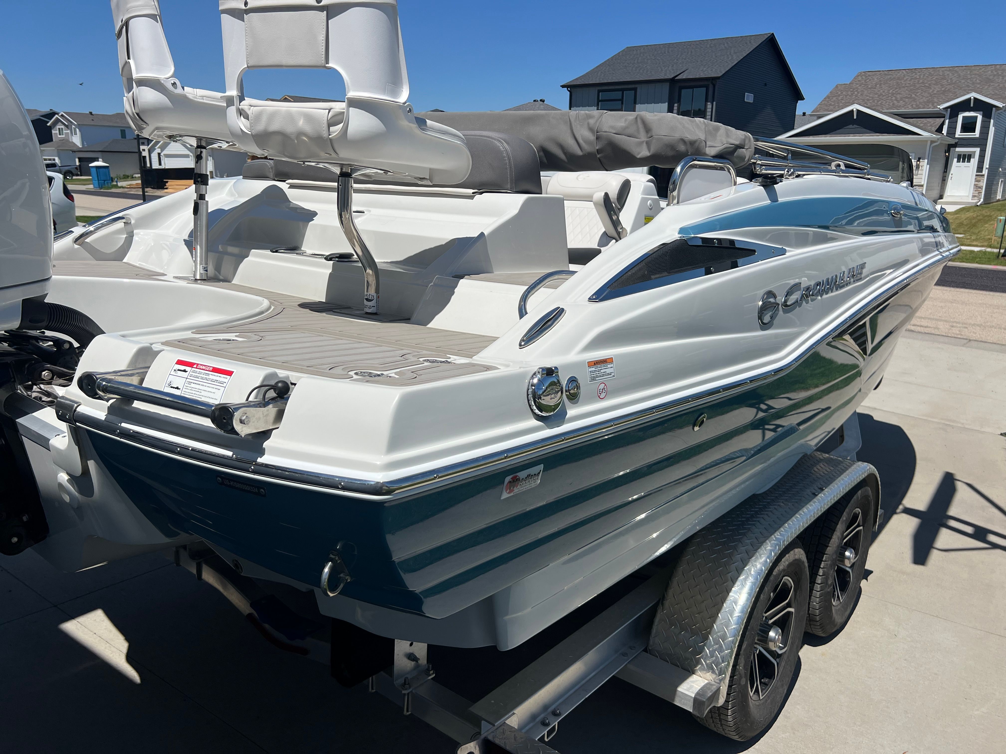 2024 Crownline Eclipse E210 XS boat on trailer.
