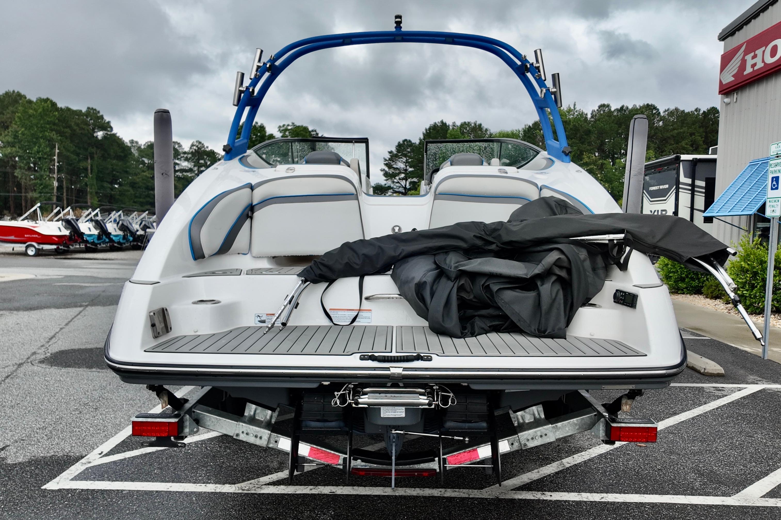 2020 Yamaha Boats AR240 on trailer, rear view, parked outdoors.