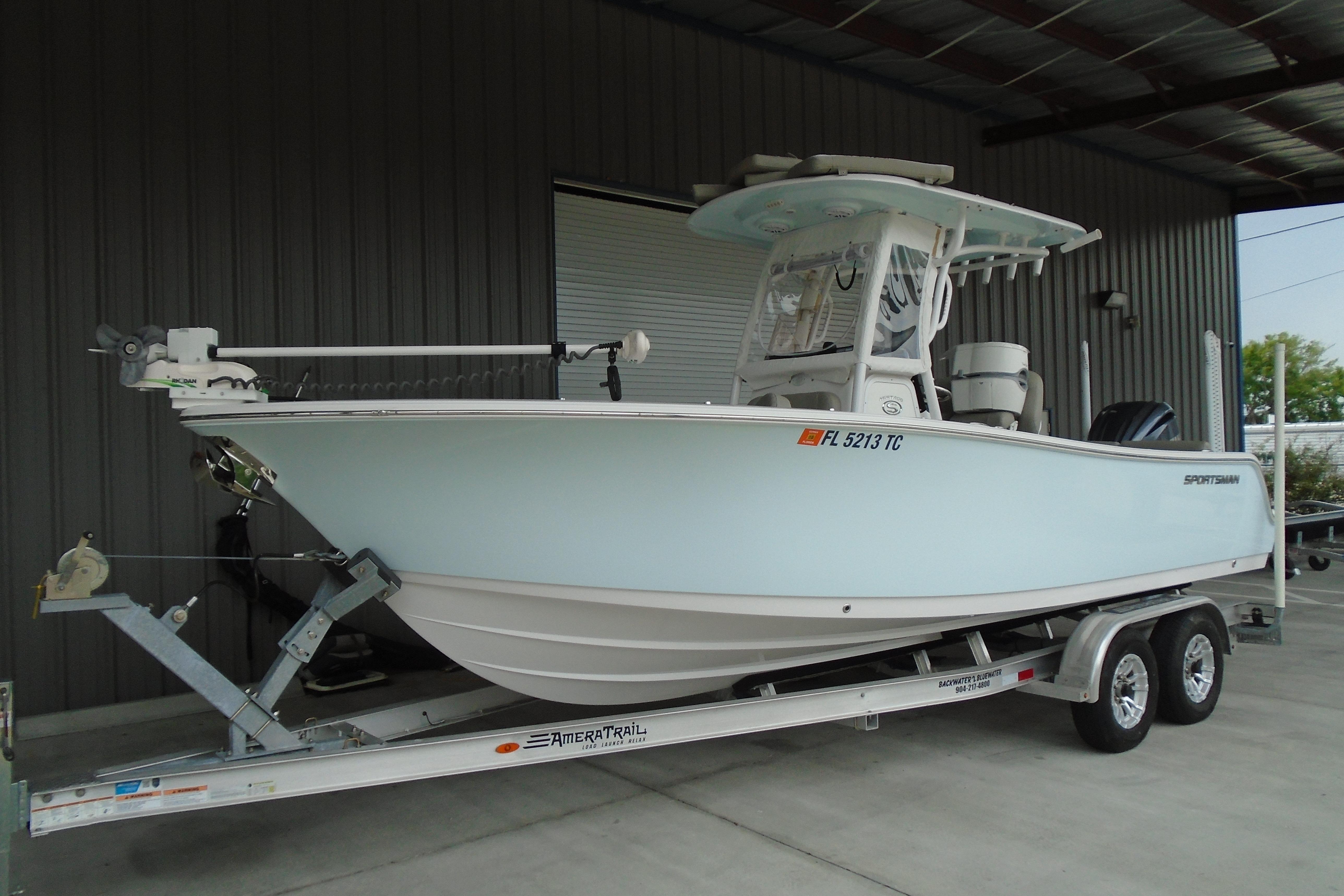 2022 Sportsman Heritage 241 Center Console boat on trailer in storage facility.