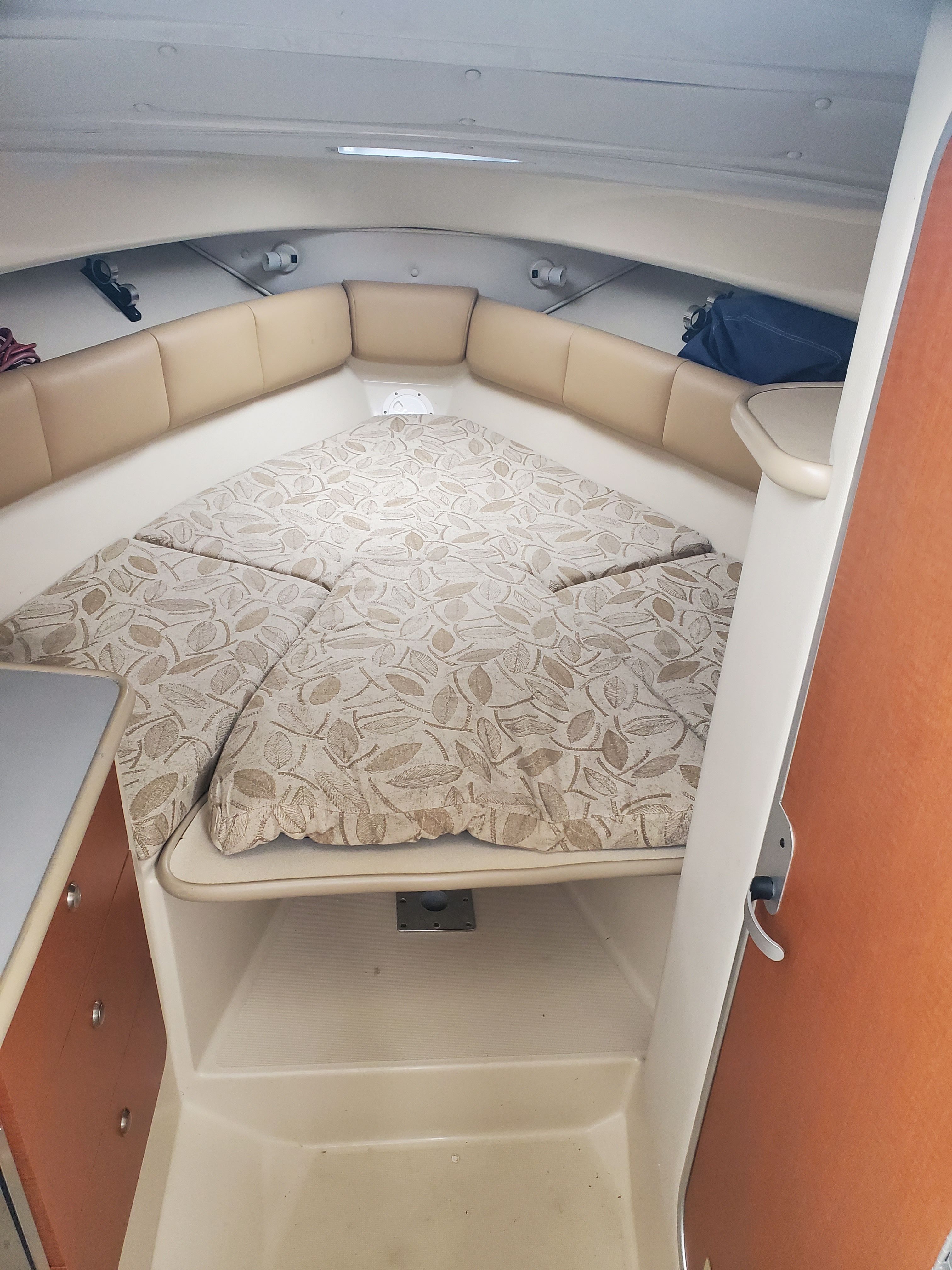 Interior of 2005 Robalo R265 Walkaround with sleeping area.