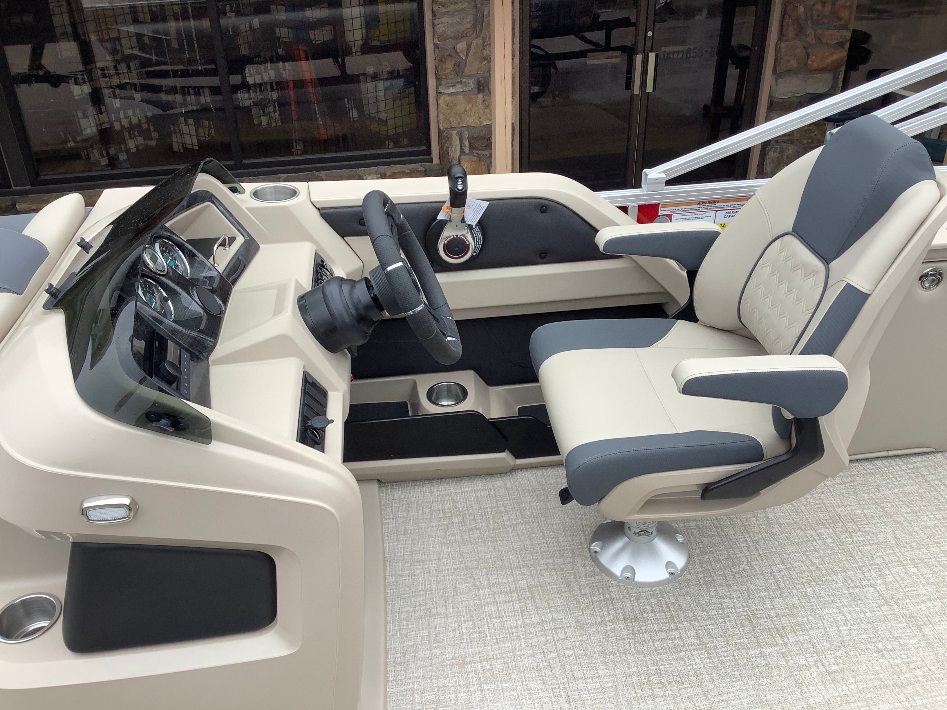 Interior of 2026 Tahoe 2185 LTZ with steering console and seat.