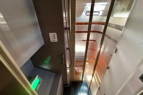Interior of a 2012 Catana 62 yacht, featuring modern design and sleek finishes.