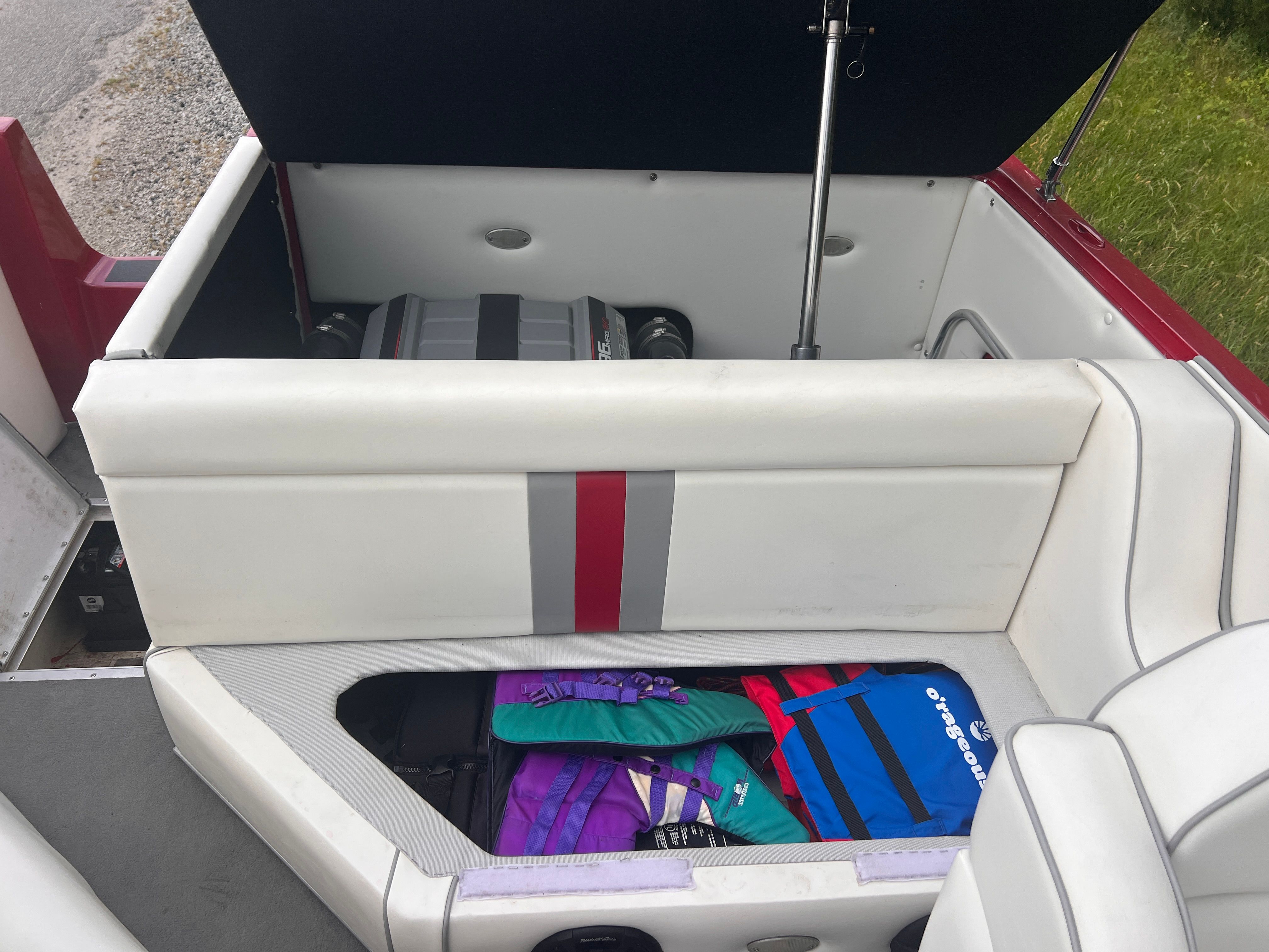 The image shows the interior of a 2008 Cheetah Fastcat boat with seating and storage.