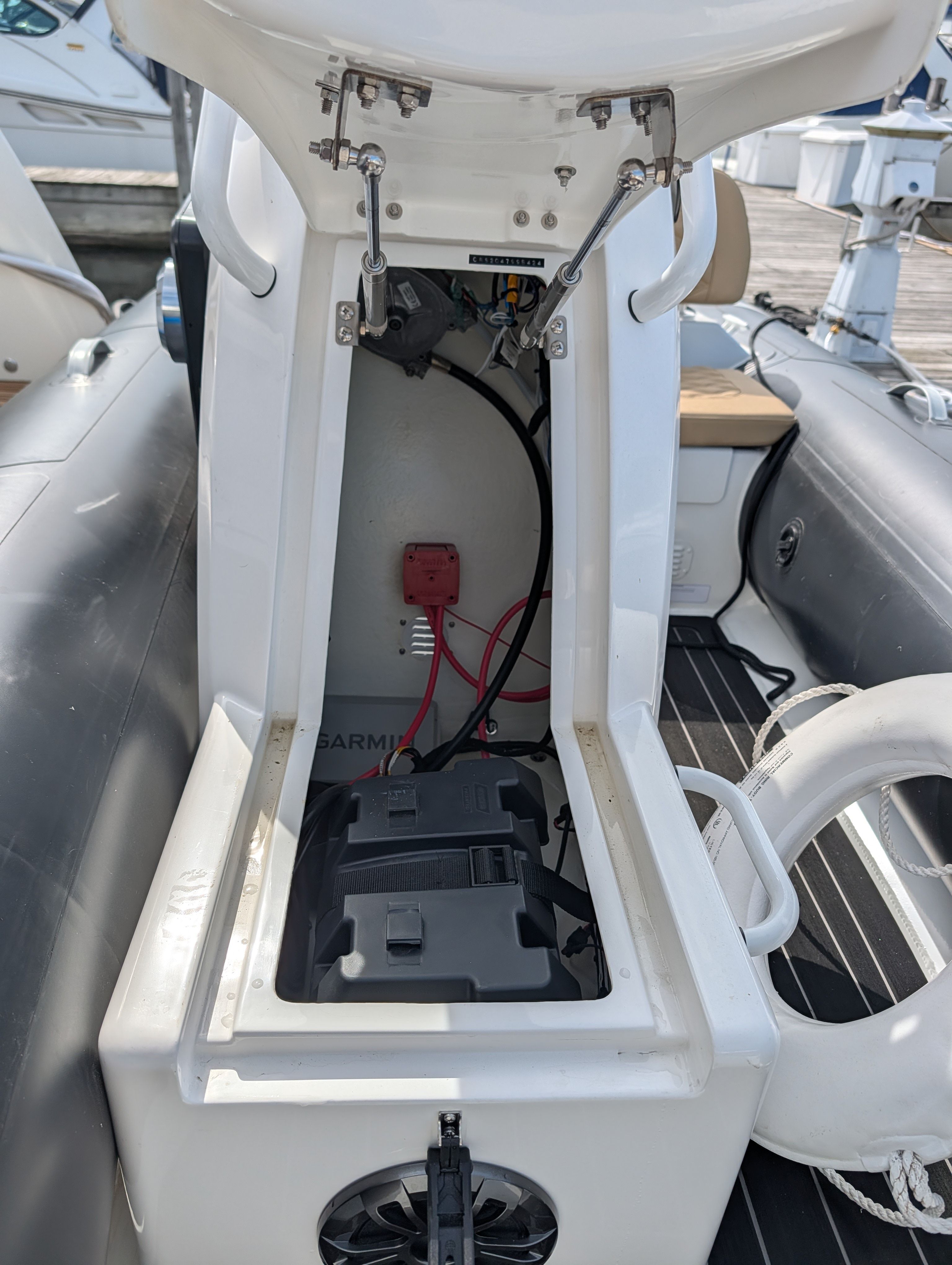 Interior view of 2024 Highfield Sport 390 boat with battery.