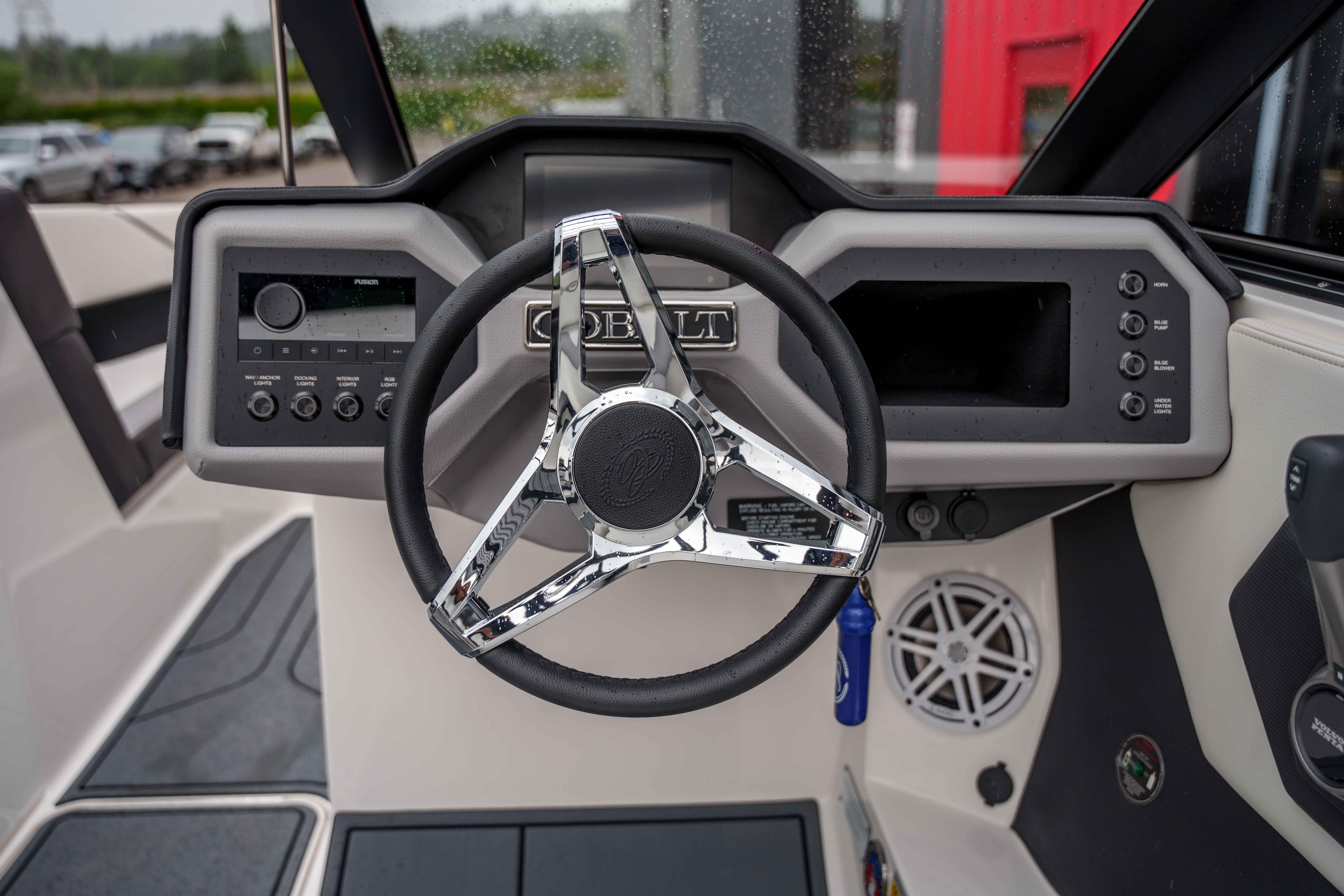 2026 Cobalt CS22 boat dashboard with modern steering wheel and control panel.