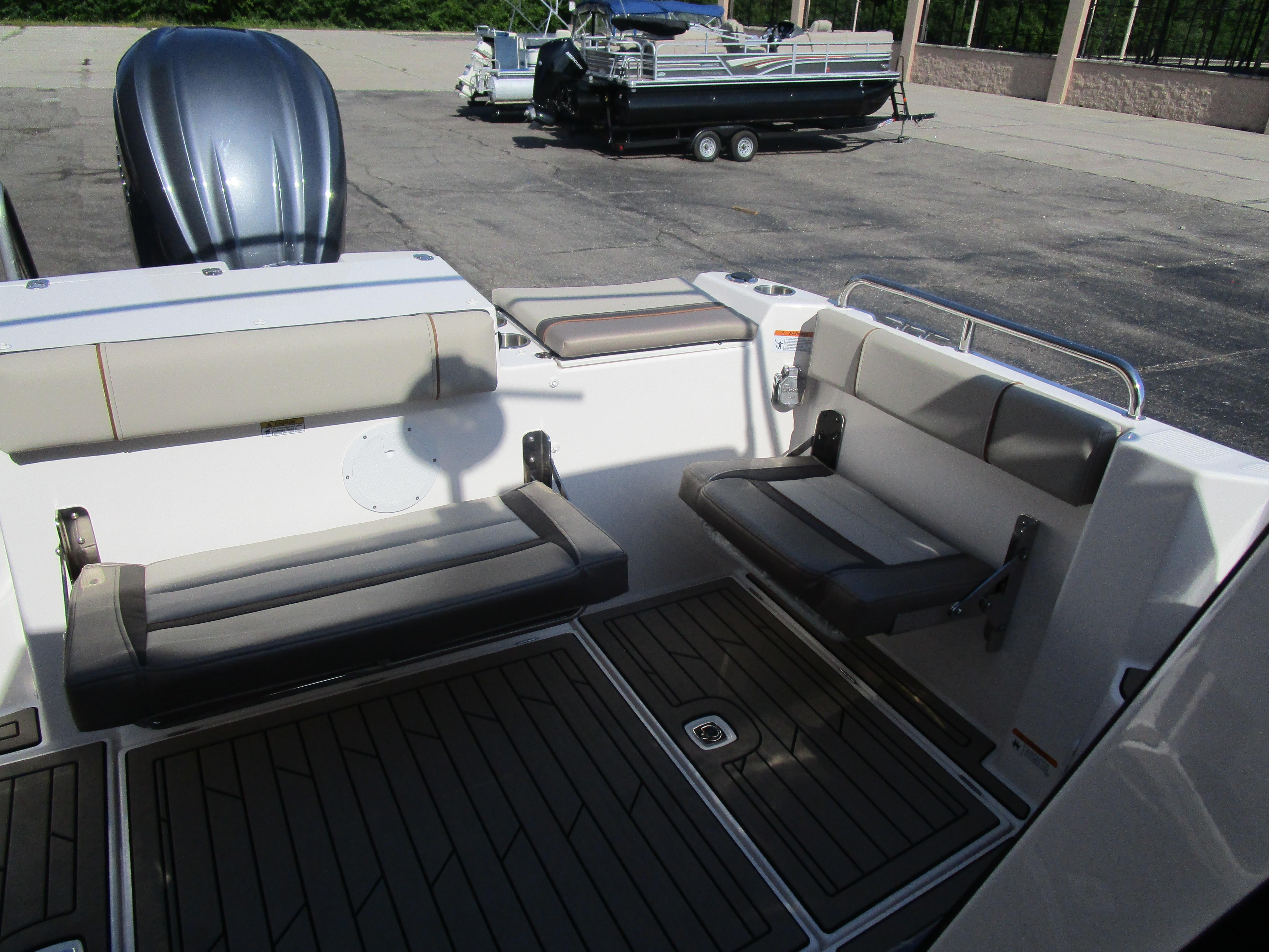 2025 Cutwater C-248 Coupe boat interior with foldable seating and sleek design.