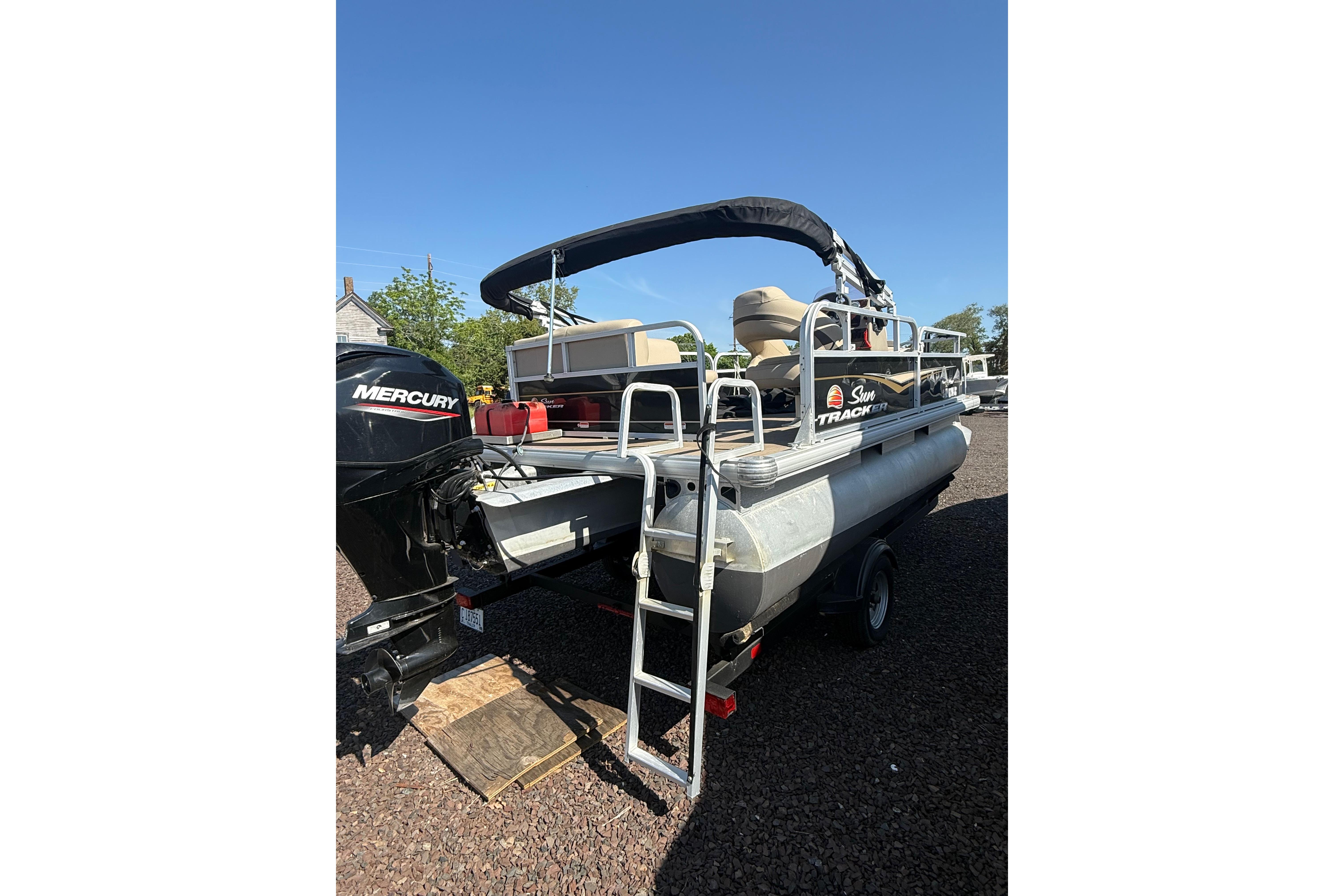 2021 Sun Tracker Bass Buggy 16 XL Select pontoon boat with Mercury engine.