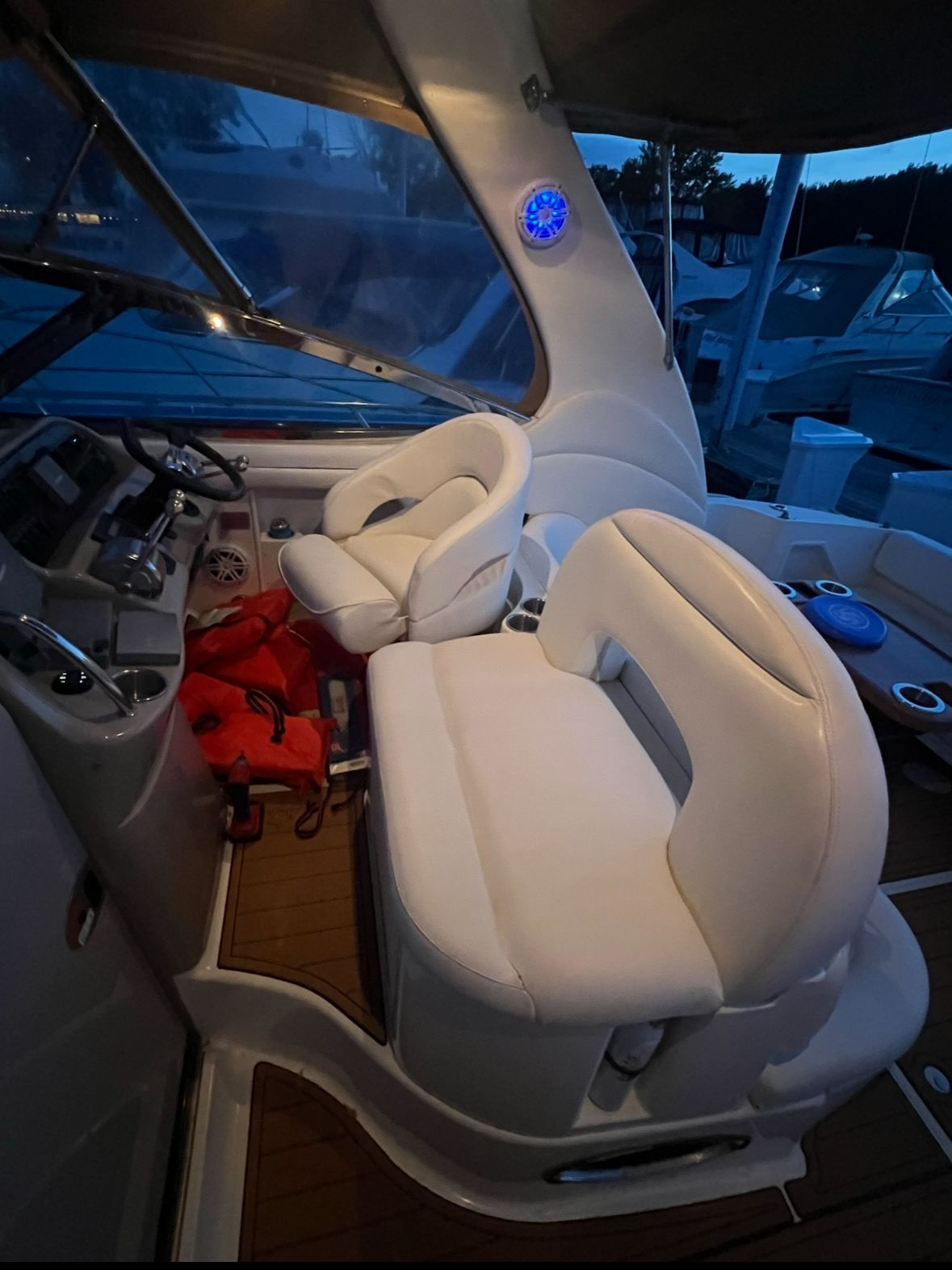 Interior of a 2002 Sea Ray 360 Sundancer with white seating.