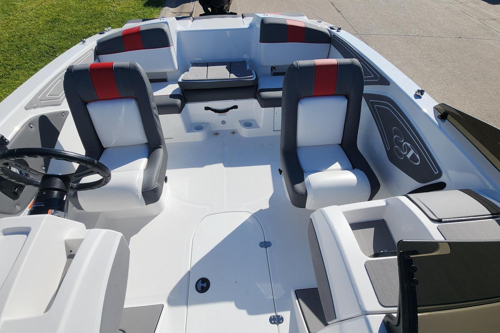 2026 Tahoe T21 boat interior with modern seating and steering wheel design.