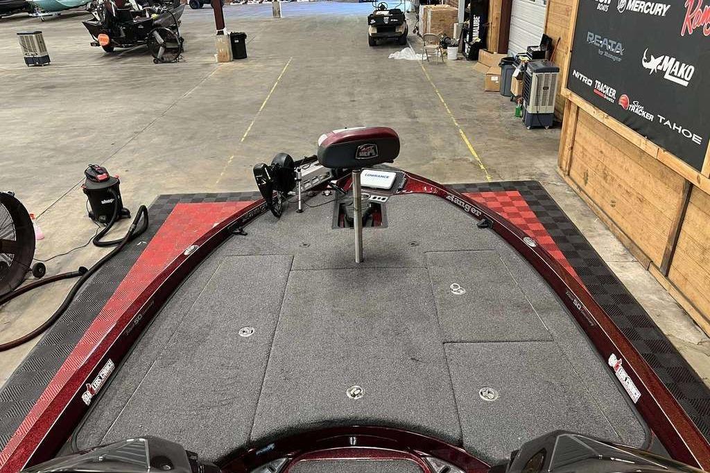 2018 Ranger Z520L boat interior in a garage, featuring a spacious deck and equipment.