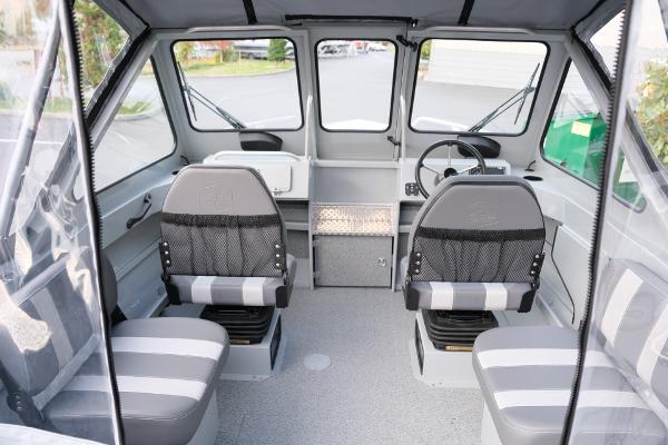 2024 Hewescraft 180 Pro-V ET boat interior with seating and steering wheel.