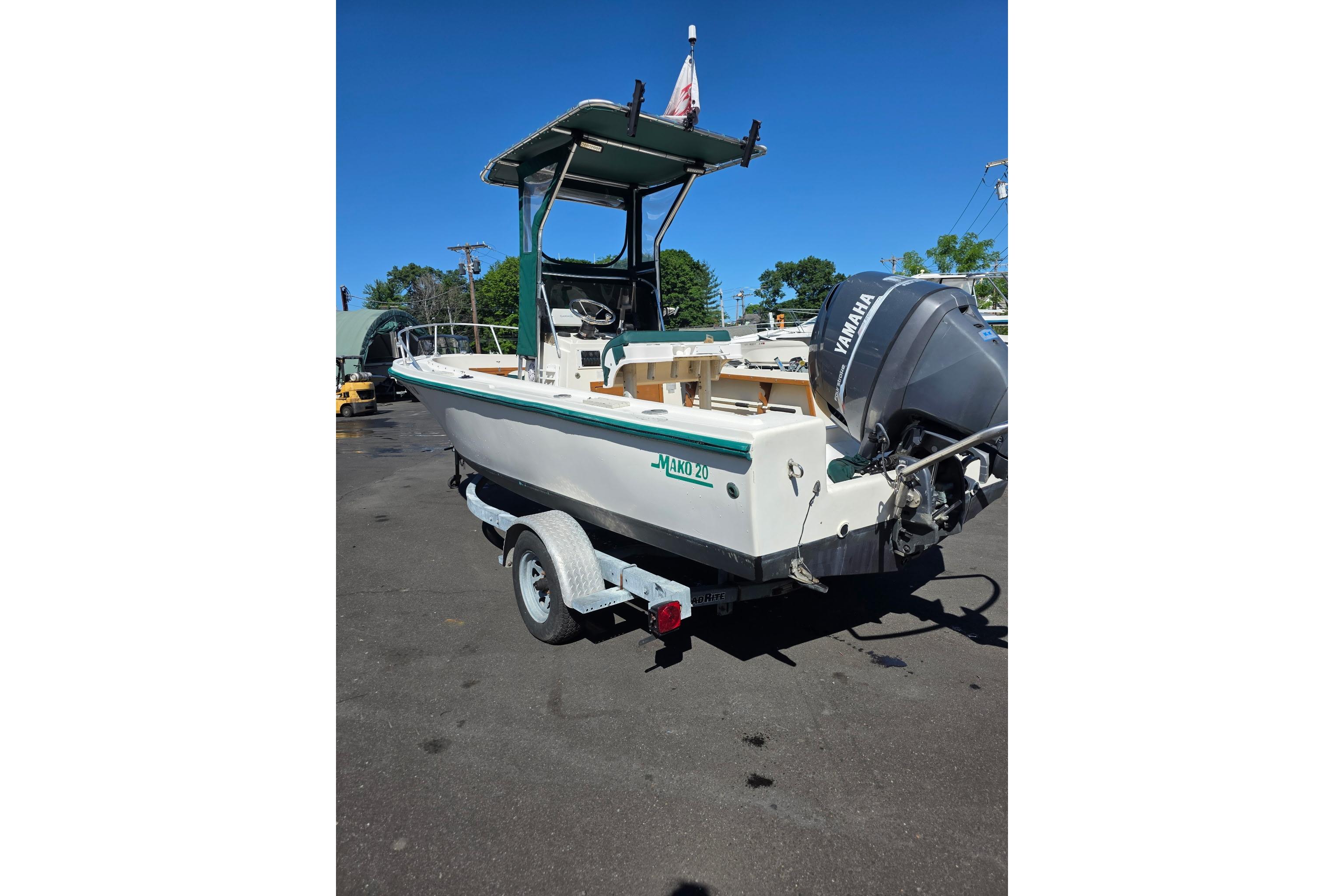 1982 Mako 20 Center Console boat with Yamaha outboard motor on trailer.