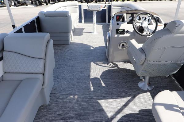 2024 Bennington 21 SSR pontoon boat interior with luxurious seating and modern helm.
