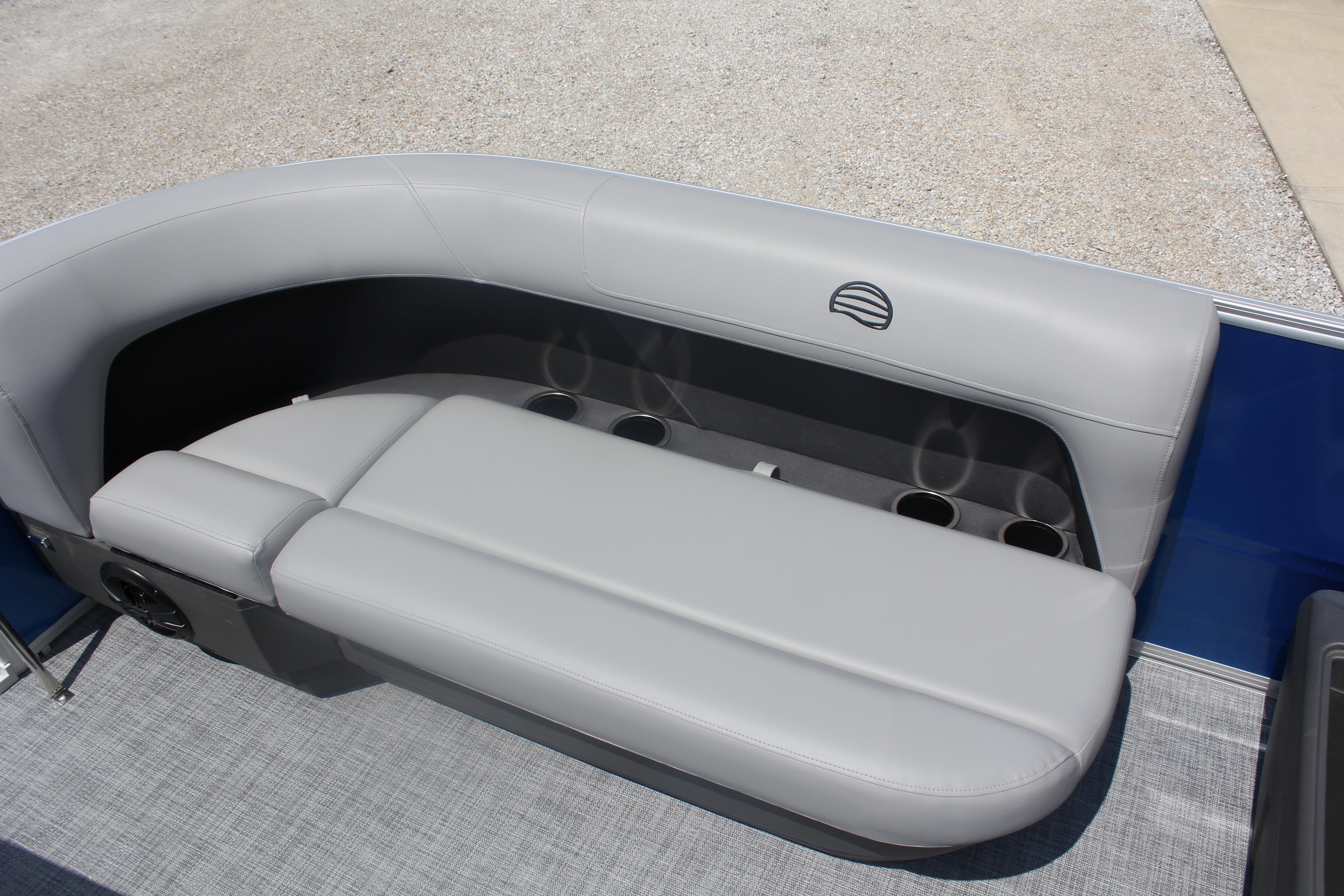 2026 Sun Tracker Party Barge 16 DLX, gray seating with cup holders.