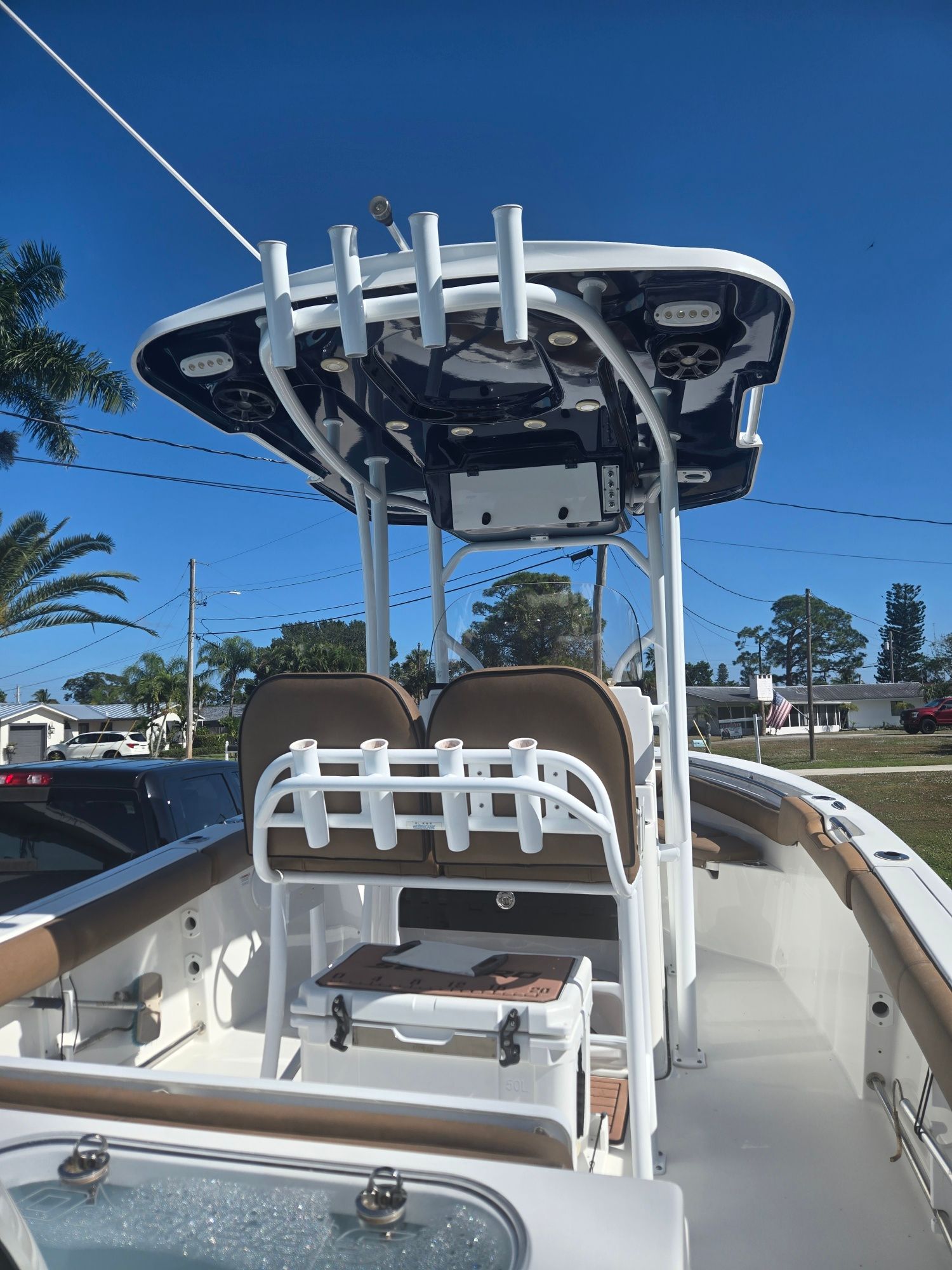 2018 Sea Pro 21.9 boat with T-top and seating area.