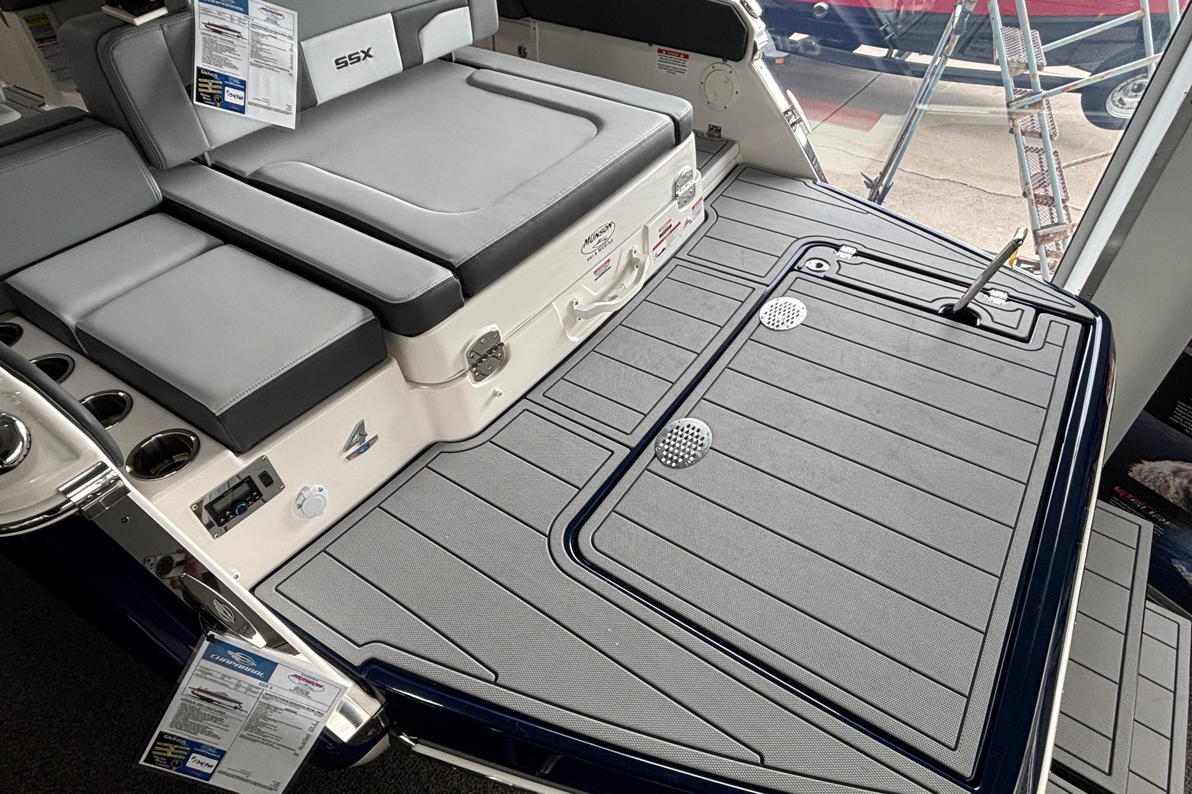 2026 Chaparral SSX 4 boat interior with gray seating and deck details.