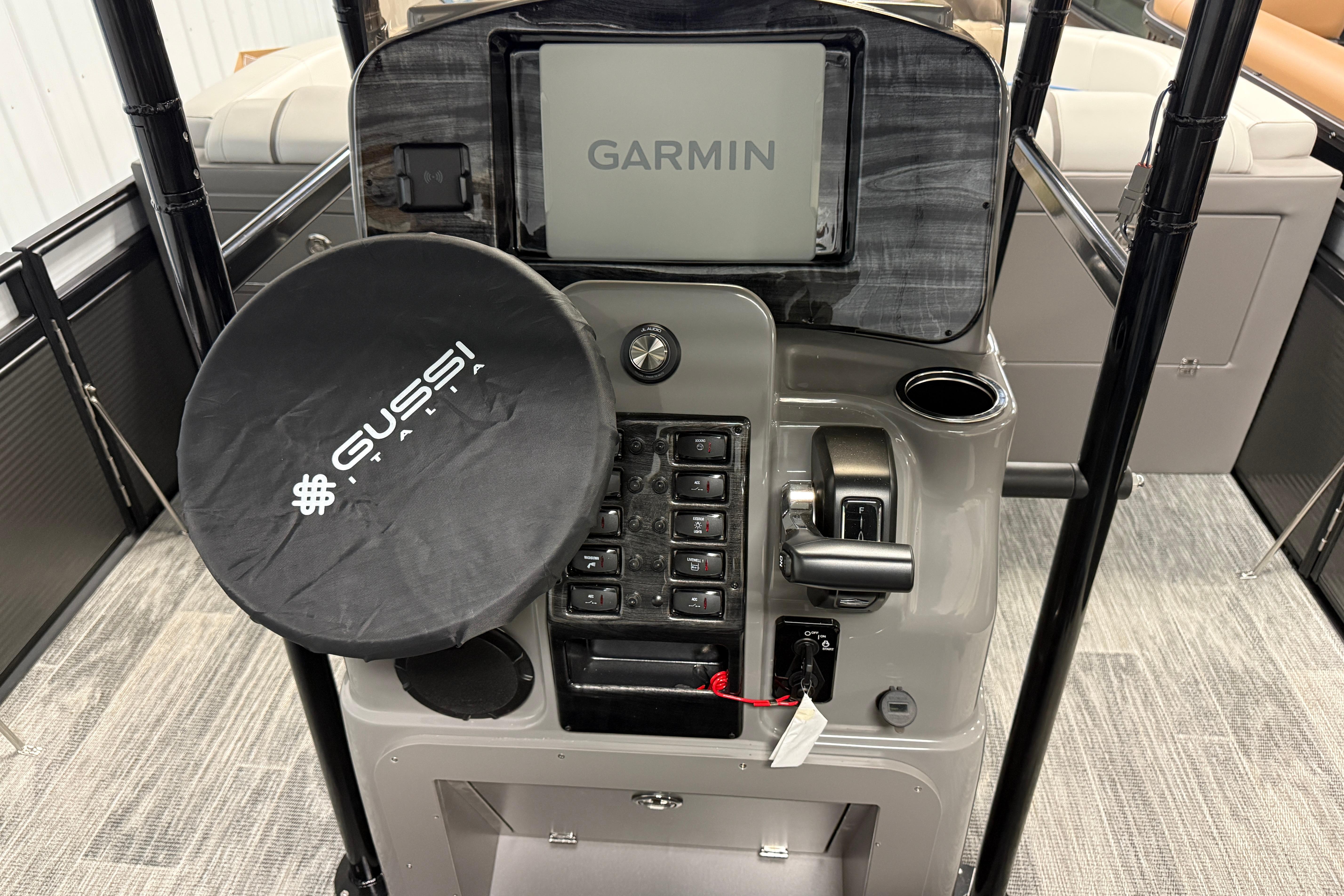 2026 Qwest M-Class 22 Pro Sport dashboard with Garmin display and Gussi Italia steering wheel.
