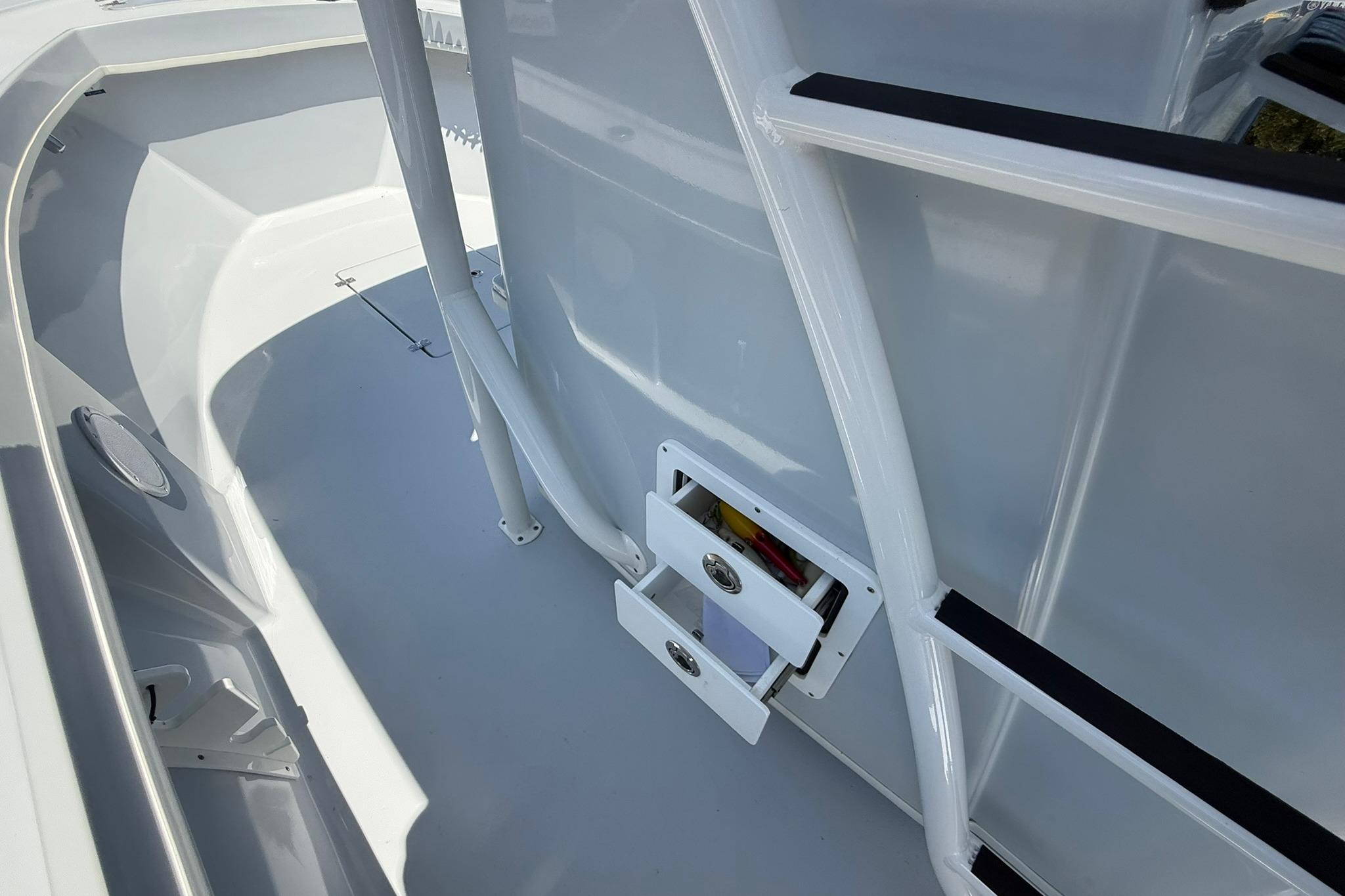 2024 Pair Customs 24 Center Console MV boat interior with storage compartments.