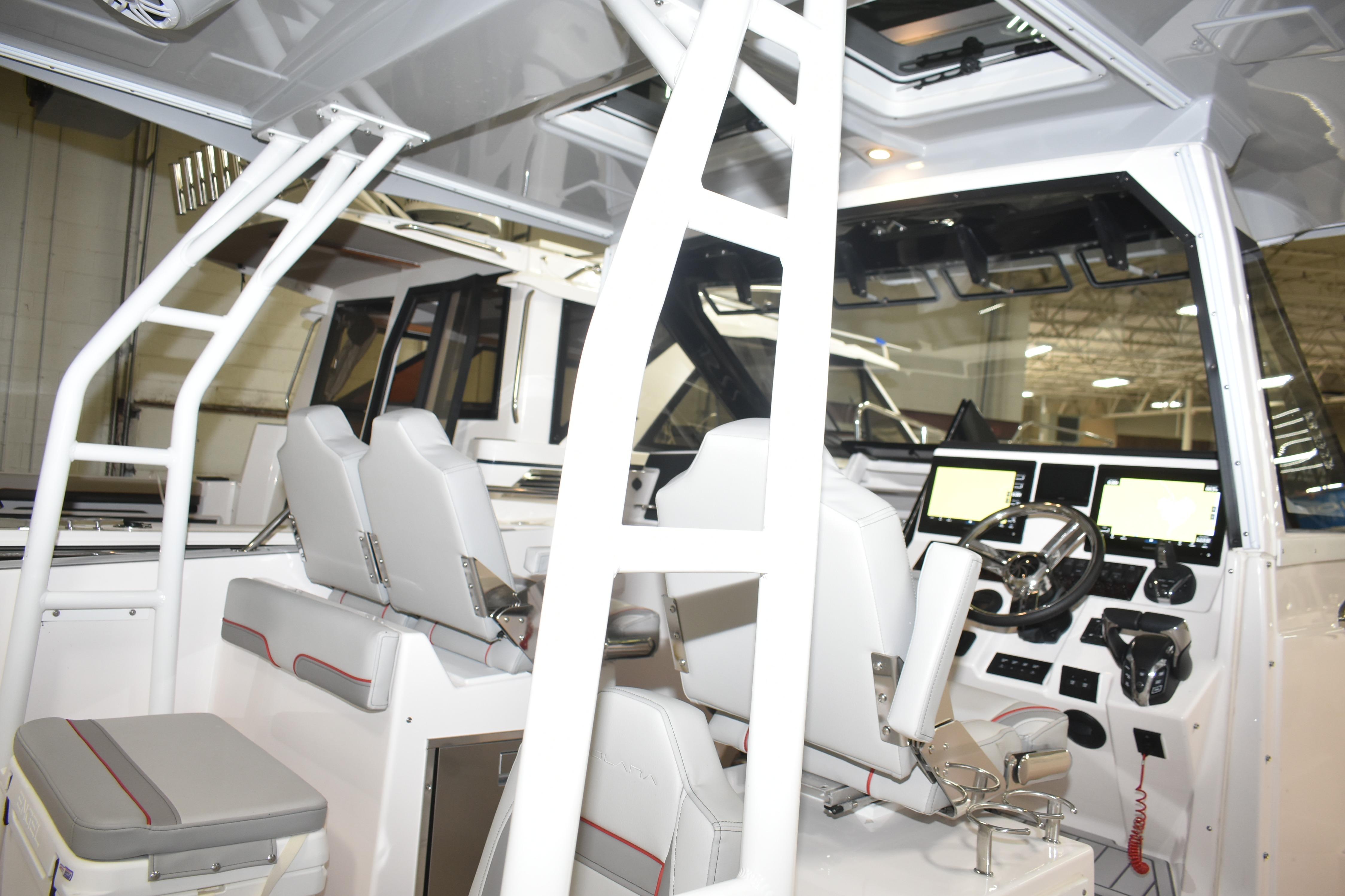 Interior of 2025 Solara S-310 CW boat with modern helm and seating.